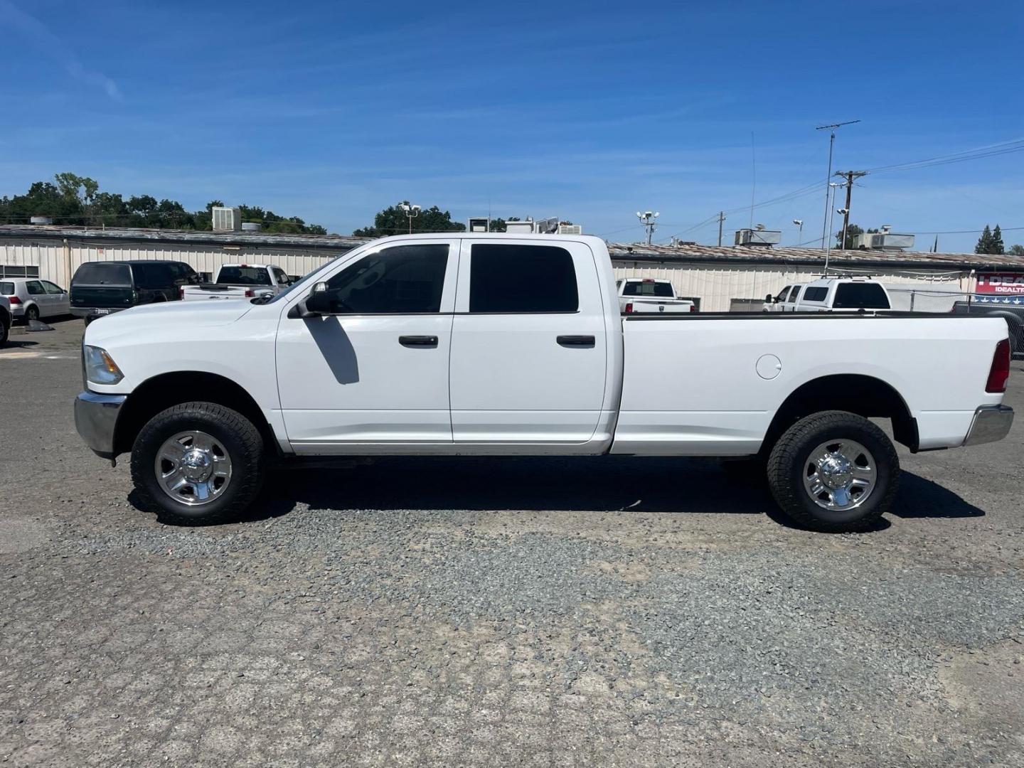 2015 Bright White Clear Coat RAM 2500 Tradesman (3C6UR5HLXFG) with an 6.7L Cummins 6.7L Diesel Turbo I6 350hp 660ft. lbs. Common Rail Direct Injection engine, Automatic transmission, located at 800 Riverside Ave, Roseville, CA, 95678, (916) 773-4549, 38.732265, -121.291039 - CUMMINS DIESEL CRW CAB 4X4 TRADESMAN CLEAN CARFAX - Photo#4
