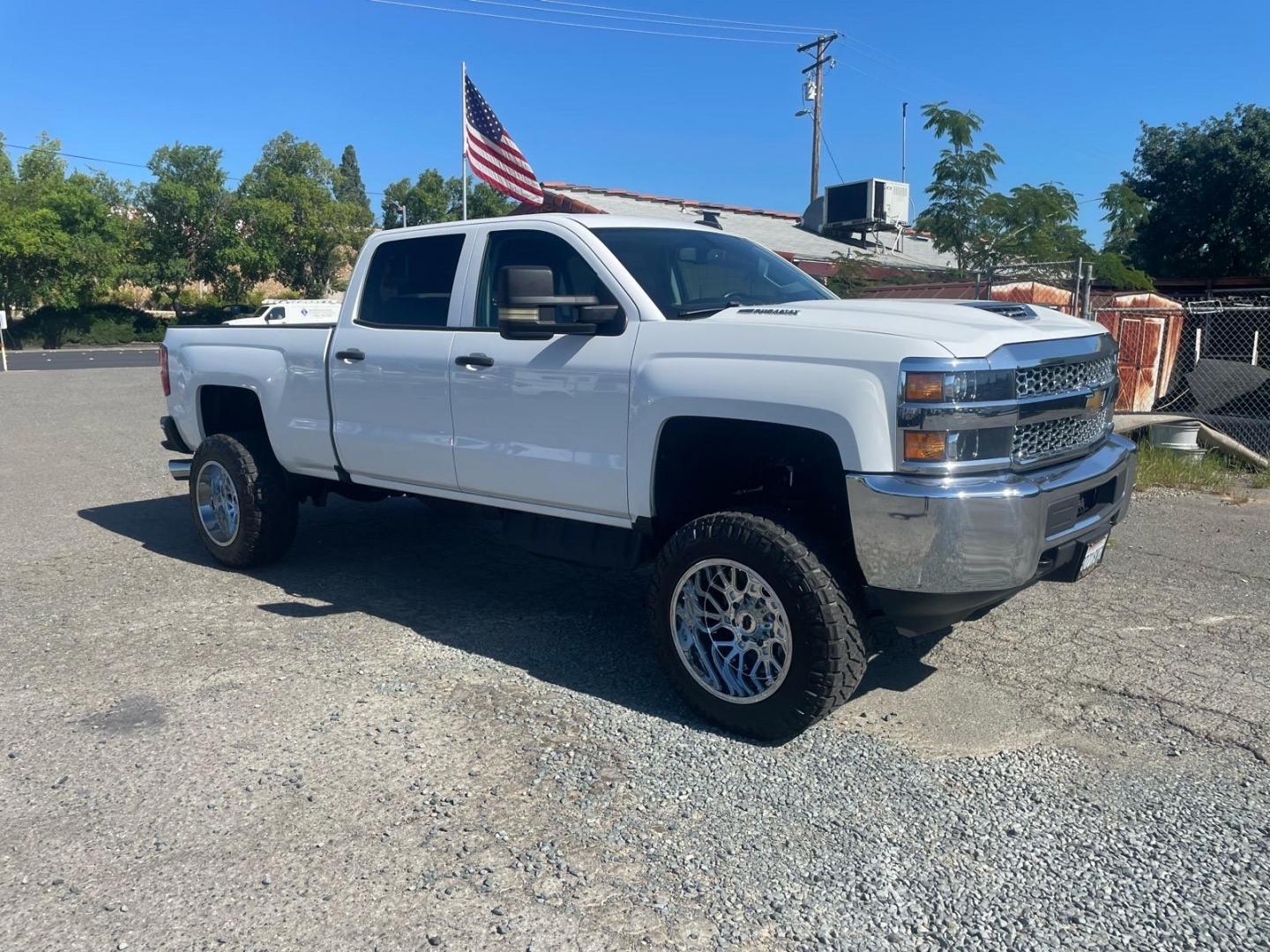 2019 Summit White Chevrolet Silverado 3500HD Work Truck (1GC4KVEY3KF) with an 6.6L Duramax 6.6L Biodiesel Turbo V8 445hp 910ft. lbs. Common Rail Direct Injection engine, Allison 1000 6-Speed Shiftable Automatic transmission, located at 800 Riverside Ave, Roseville, CA, 95678, (916) 773-4549, 38.732265, -121.291039 - DURAMAX DIESEL CREW CAB 4X4 LIFTED CUSTOM WHEELS ALLISON TRANSMISSION - Photo#1