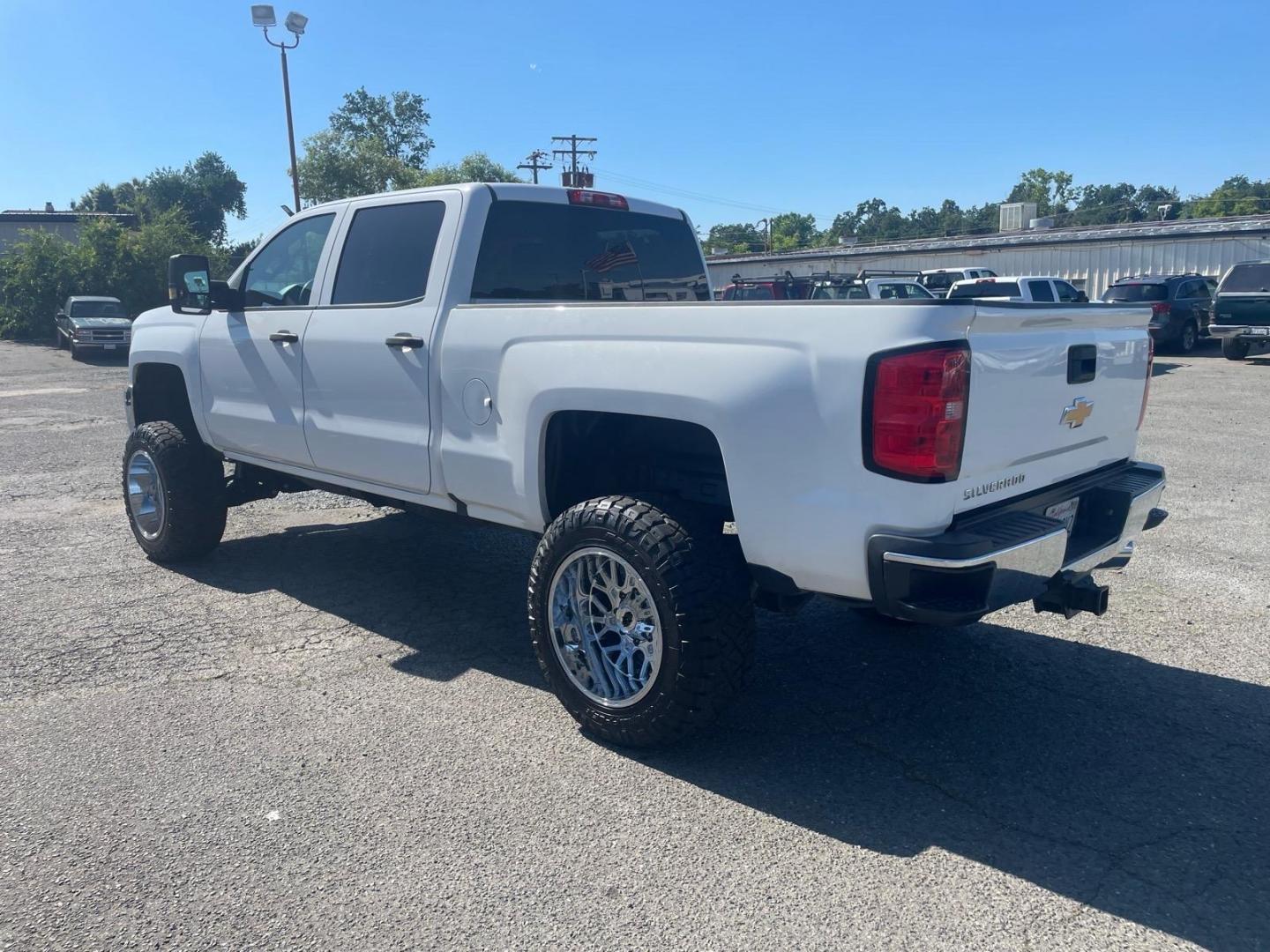 2019 Summit White Chevrolet Silverado 3500HD Work Truck (1GC4KVEY3KF) with an 6.6L Duramax 6.6L Biodiesel Turbo V8 445hp 910ft. lbs. Common Rail Direct Injection engine, Allison 1000 6-Speed Shiftable Automatic transmission, located at 800 Riverside Ave, Roseville, CA, 95678, (916) 773-4549, 38.732265, -121.291039 - DURAMAX DIESEL CREW CAB 4X4 LIFTED CUSTOM WHEELS ALLISON TRANSMISSION - Photo#3