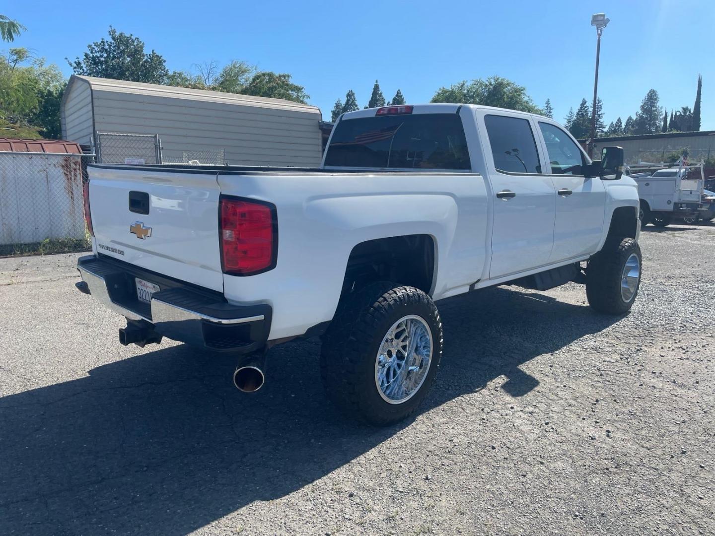 2019 Summit White Chevrolet Silverado 3500HD Work Truck (1GC4KVEY3KF) with an 6.6L Duramax 6.6L Biodiesel Turbo V8 445hp 910ft. lbs. Common Rail Direct Injection engine, Allison 1000 6-Speed Shiftable Automatic transmission, located at 800 Riverside Ave, Roseville, CA, 95678, (916) 773-4549, 38.732265, -121.291039 - DURAMAX DIESEL CREW CAB 4X4 LIFTED CUSTOM WHEELS ALLISON TRANSMISSION - Photo#4