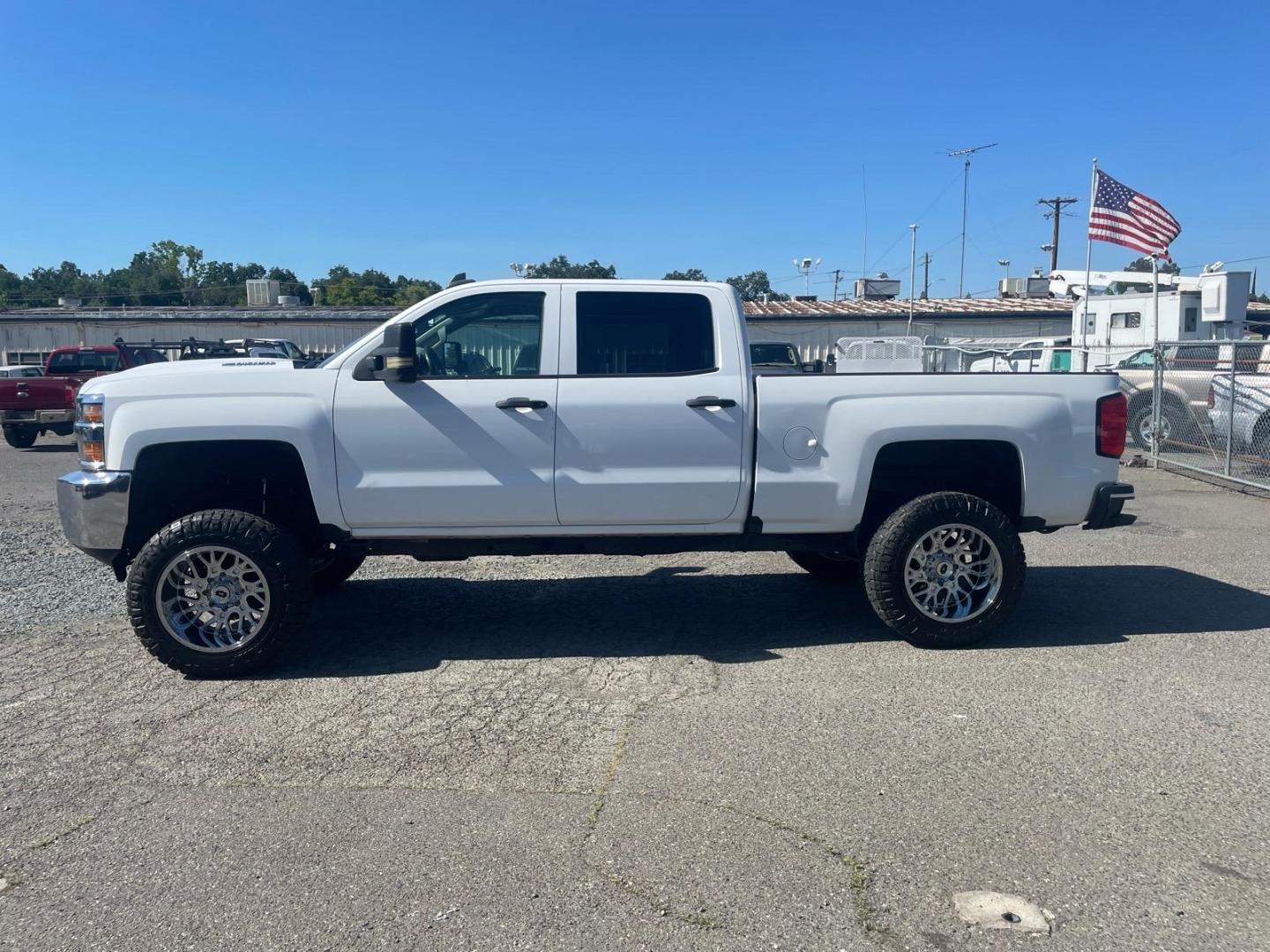 2019 Summit White Chevrolet Silverado 3500HD Work Truck (1GC4KVEY3KF) with an 6.6L Duramax 6.6L Biodiesel Turbo V8 445hp 910ft. lbs. Common Rail Direct Injection engine, Allison 1000 6-Speed Shiftable Automatic transmission, located at 800 Riverside Ave, Roseville, CA, 95678, (916) 773-4549, 38.732265, -121.291039 - DURAMAX DIESEL CREW CAB 4X4 LIFTED CUSTOM WHEELS ALLISON TRANSMISSION - Photo#5