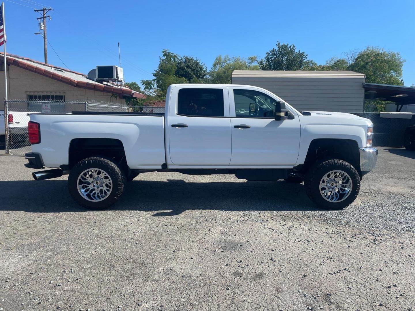 2019 Summit White Chevrolet Silverado 3500HD Work Truck (1GC4KVEY3KF) with an 6.6L Duramax 6.6L Biodiesel Turbo V8 445hp 910ft. lbs. Common Rail Direct Injection engine, Allison 1000 6-Speed Shiftable Automatic transmission, located at 800 Riverside Ave, Roseville, CA, 95678, (916) 773-4549, 38.732265, -121.291039 - DURAMAX DIESEL CREW CAB 4X4 LIFTED CUSTOM WHEELS ALLISON TRANSMISSION - Photo#6