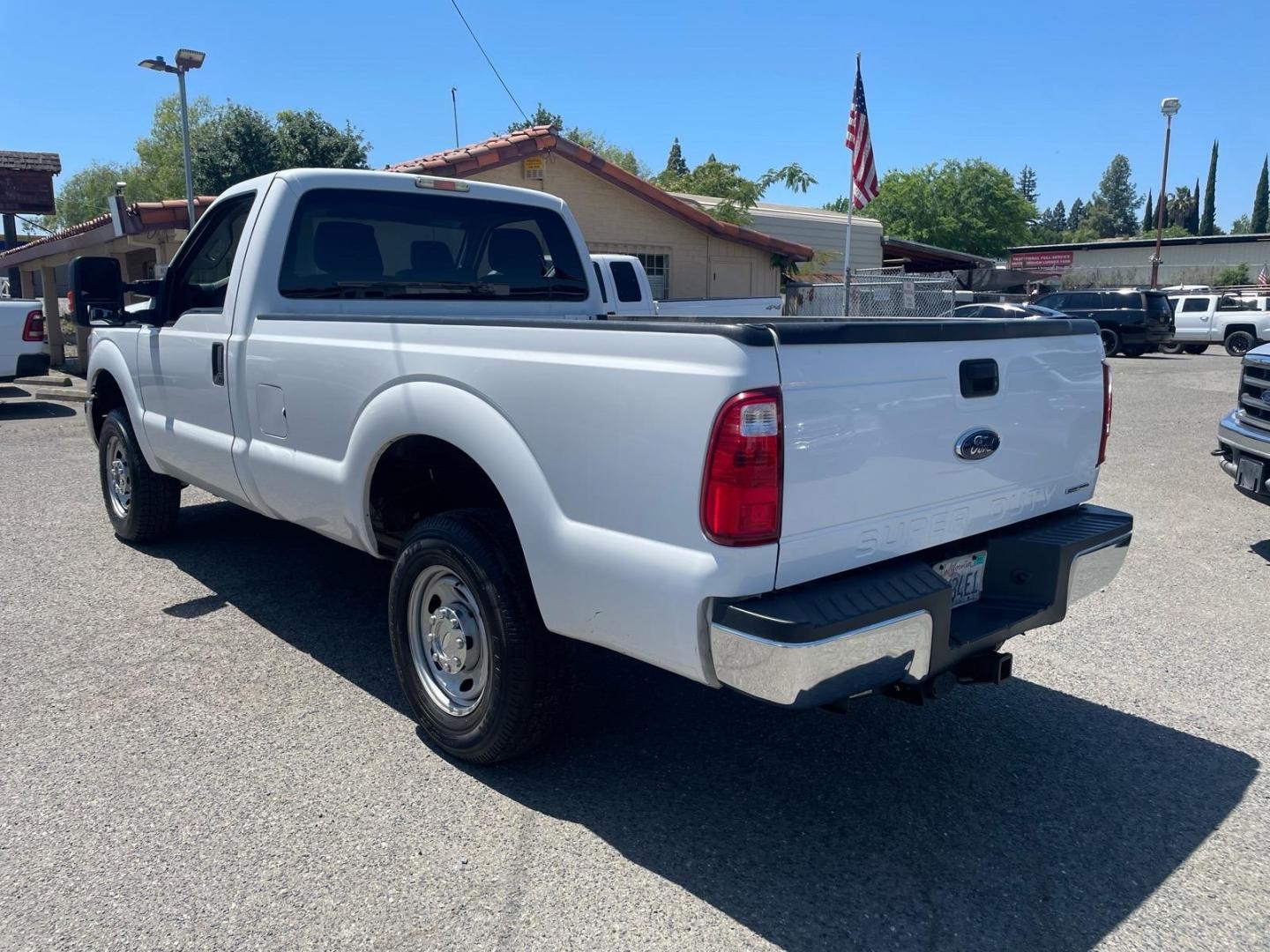 2012 Oxford White Ford F-250 Super Duty XL (1FTBF2B63CE) with an 6.2L 6.2L Flex Fuel V8 385hp 405ft. lbs. Sequential Electronic Fuel Injection engine, 6-Speed Shiftable Automatic transmission, located at 800 Riverside Ave, Roseville, CA, 95678, (916) 773-4549, 38.732265, -121.291039 - 4X4 XL LOW MILES - Photo#2
