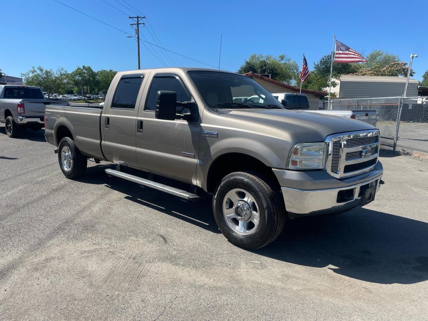 2006 Arizona Beige Clearcoat Metallic (aq) Ford F-250 Super Duty Lariat (1FTSW21P86E) with an 6.0L Power Stroke 6.0L Diesel Turbo V8 325hp 560ft. lbs. Direct Injection engine, 5-Speed Automatic transmission, located at 800 Riverside Ave, Roseville, CA, 95678, (916) 773-4549, 38.732265, -121.291039- Photo#1