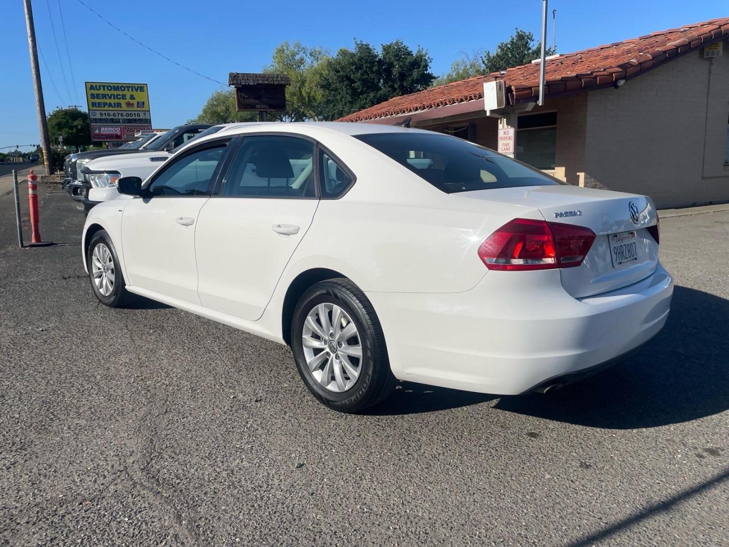 2015 Candy White Volkswagen Passat 1.8T Wolfsburg Edition (1VWAT7A35FC) with an 1.8L 1.8L Turbo I4 170hp 184ft. lbs. Direct Injection engine, 6-Speed Shiftable Automatic transmission, located at 800 Riverside Ave, Roseville, CA, 95678, (916) 773-4549, 38.732265, -121.291039- Photo#2