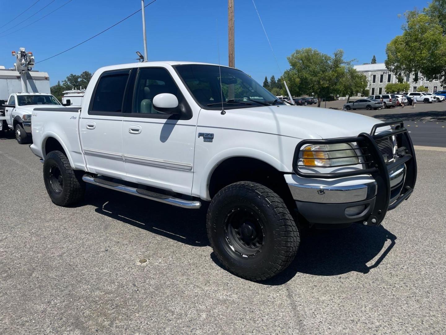 2003 Oxford White Ford F-150 Lariat (1FTRW08L83K) with an Triton 5.4L V8 260hp 350ft. lbs. Other engine, 4-Speed Automatic transmission, located at 800 Riverside Ave, Roseville, CA, 95678, (916) 773-4549, 38.732265, -121.291039 - 4X4 SUPERCREW LARIAT LOW MILES MOON ROOF- Photo#1