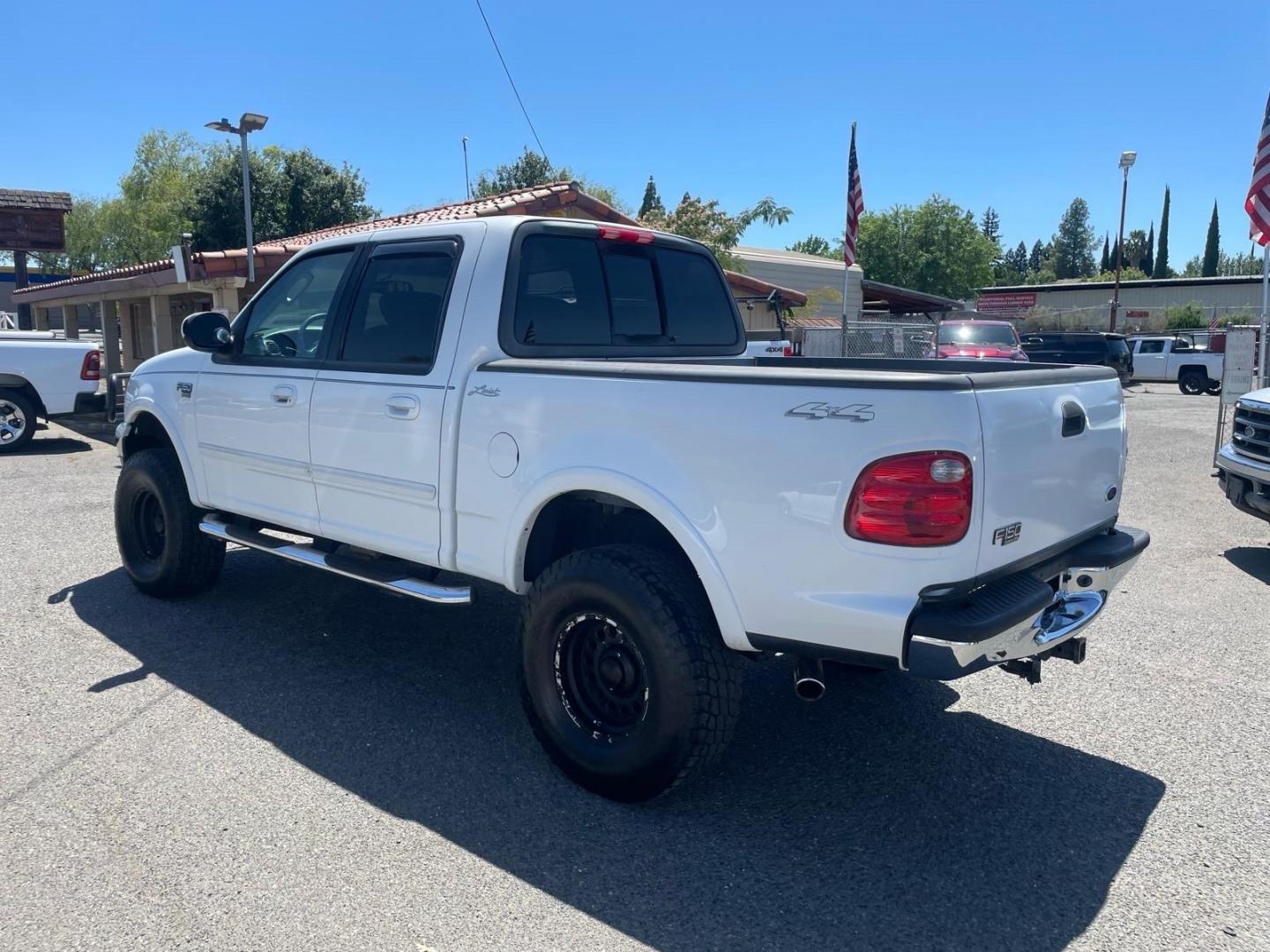 2003 Oxford White Ford F-150 Lariat (1FTRW08L83K) with an Triton 5.4L V8 260hp 350ft. lbs. Other engine, 4-Speed Automatic transmission, located at 800 Riverside Ave, Roseville, CA, 95678, (916) 773-4549, 38.732265, -121.291039 - 4X4 SUPERCREW LARIAT LOW MILES MOON ROOF- Photo#2