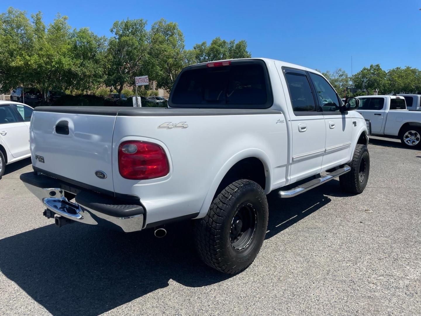 2003 Oxford White Ford F-150 Lariat (1FTRW08L83K) with an Triton 5.4L V8 260hp 350ft. lbs. Other engine, 4-Speed Automatic transmission, located at 800 Riverside Ave, Roseville, CA, 95678, (916) 773-4549, 38.732265, -121.291039 - 4X4 SUPERCREW LARIAT LOW MILES MOON ROOF- Photo#3