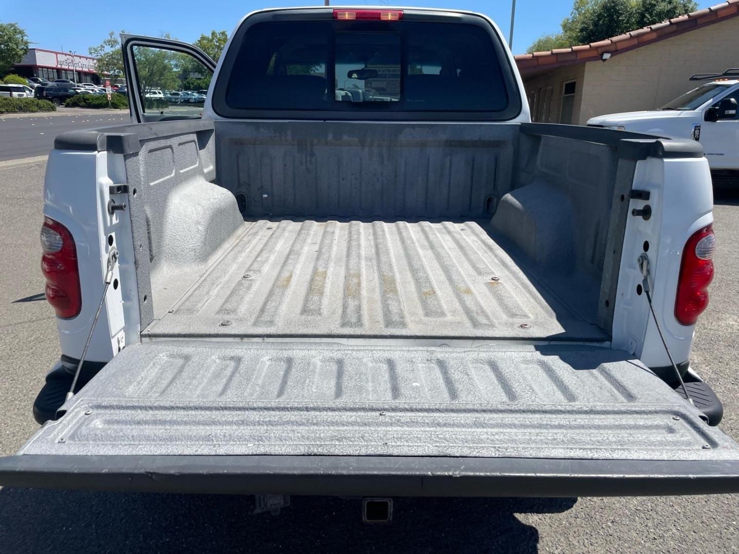2003 Oxford White Ford F-150 Lariat (1FTRW08L83K) with an Triton 5.4L V8 260hp 350ft. lbs. Other engine, 4-Speed Automatic transmission, located at 800 Riverside Ave, Roseville, CA, 95678, (916) 773-4549, 38.732265, -121.291039 - 4X4 SUPERCREW LARIAT LOW MILES MOON ROOF- Photo#8
