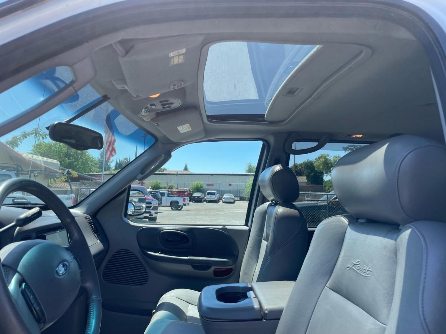 2003 Oxford White Ford F-150 Lariat (1FTRW08L83K) with an Triton 5.4L V8 260hp 350ft. lbs. Other engine, 4-Speed Automatic transmission, located at 800 Riverside Ave, Roseville, CA, 95678, (916) 773-4549, 38.732265, -121.291039 - 4X4 SUPERCREW LARIAT LOW MILES MOON ROOF- Photo#9