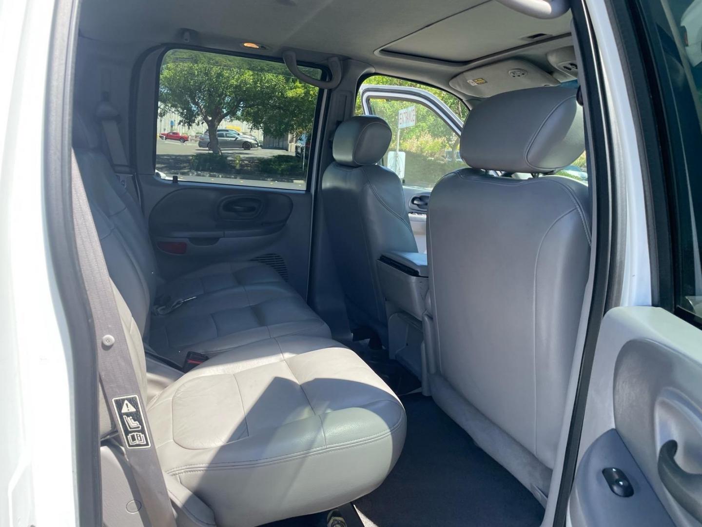 2003 Oxford White Ford F-150 Lariat (1FTRW08L83K) with an Triton 5.4L V8 260hp 350ft. lbs. Other engine, 4-Speed Automatic transmission, located at 800 Riverside Ave, Roseville, CA, 95678, (916) 773-4549, 38.732265, -121.291039 - 4X4 SUPERCREW LARIAT LOW MILES MOON ROOF- Photo#13