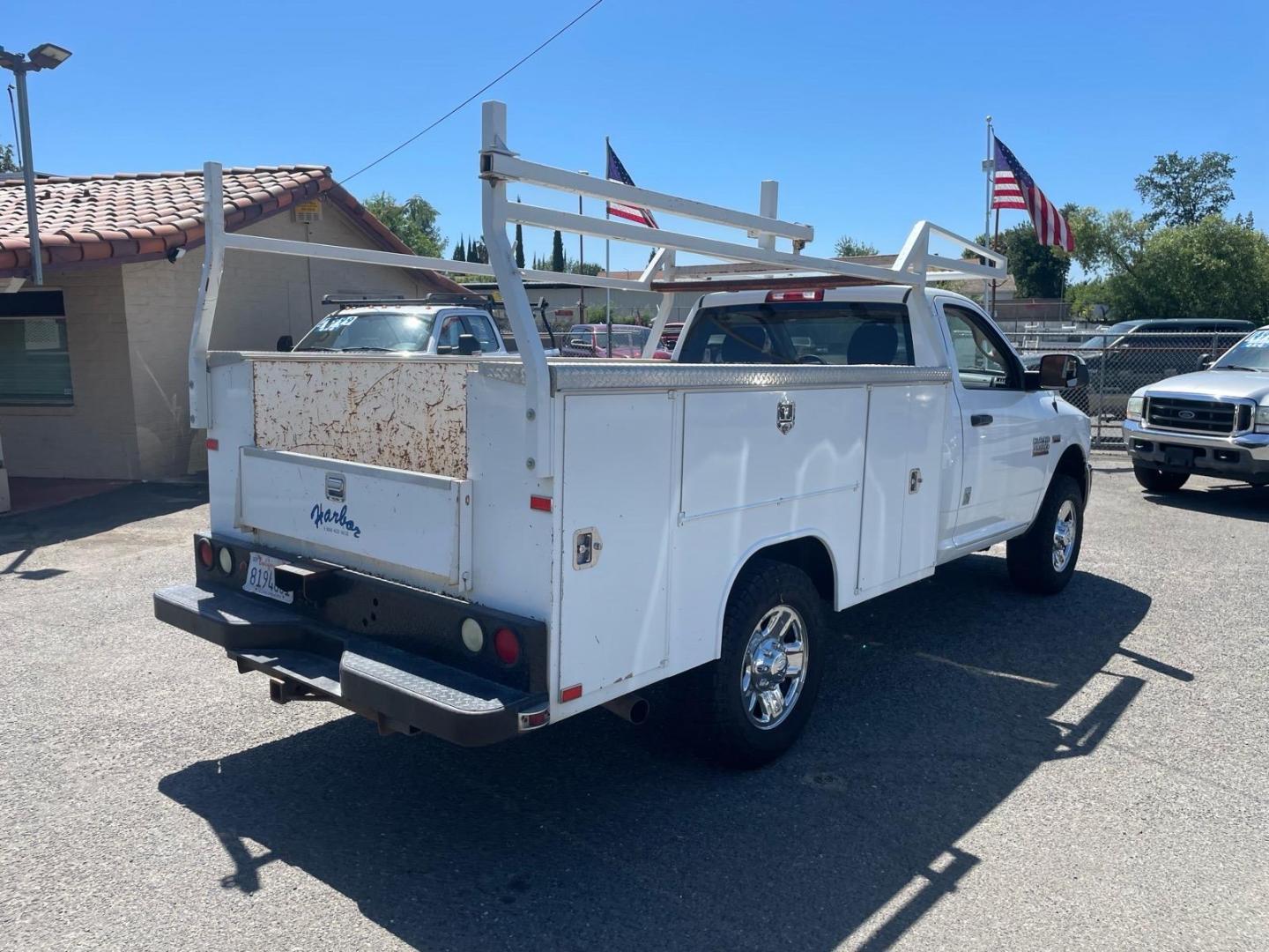 2014 White RAM 3500 Tradesman (3C7WR8AJ2EG) with an HEMI 6.4L V8 370hp 429ft. lbs. Other engine, 6-Speed Shiftable Automatic transmission, located at 800 Riverside Ave, Roseville, CA, 95678, (916) 773-4549, 38.732265, -121.291039 - Photo#3