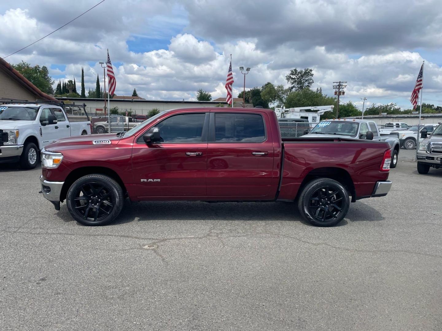 2020 Delmonico Red Pearl Coat RAM 1500 Big Horn (1C6SRFFM0LN) with an 3.0L EcoDiesel 3.0L Biodiesel Turbo V6 260hp 480ft. lbs. Common Rail Direct Injection engine, 8-Speed Shiftable Automatic transmission, located at 800 Riverside Ave, Roseville, CA, 95678, (916) 773-4549, 38.732265, -121.291039 - ECODIESEL CREW CAB 4X4 BIG HORN SERVICE RECORDS CLEAN CARFAX - Photo#4