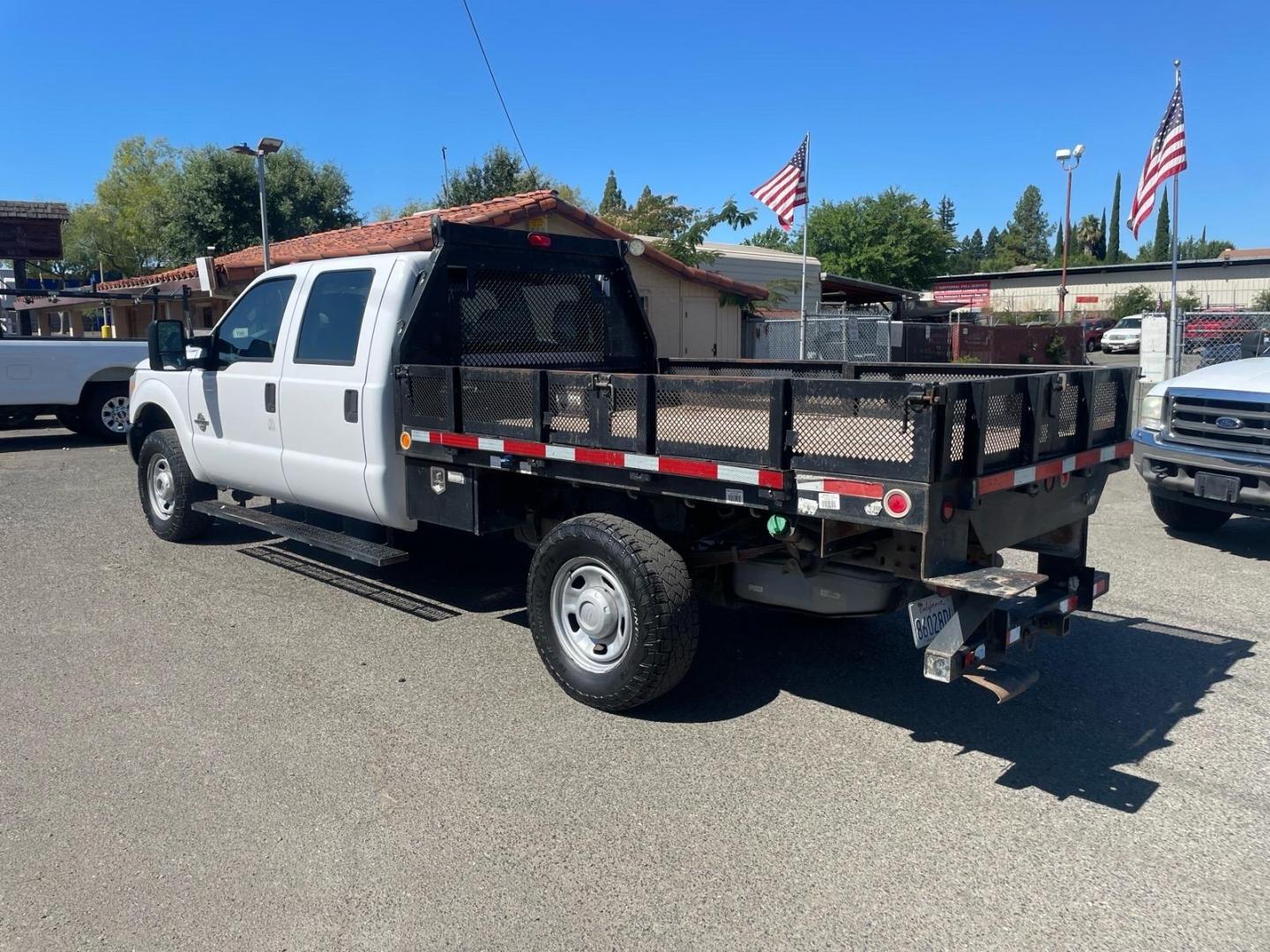 2014 White Ford F-350 Super Duty XL (1FD8W3FTXEE) with an 6.7L Power Stroke 6.7L Biodiesel Turbo V8 300hp 660ft. lbs. Common Rail Direct Injection engine, 6-Speed Shiftable Automatic transmission, located at 800 Riverside Ave, Roseville, CA, 95678, (916) 773-4549, 38.732265, -121.291039- Photo#2