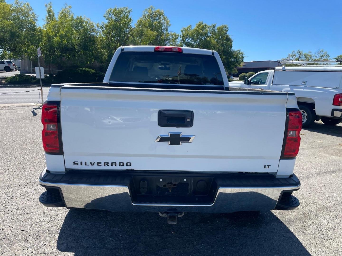 2015 Summit White Chevrolet Silverado 1500 LT (3GCUKREC8FG) with an 5.3L EcoTec3 5.3L V8 355hp 383ft. lbs. Direct Injection engine, 6-Speed Shiftable Automatic w/Overdrive transmission, located at 800 Riverside Ave, Roseville, CA, 95678, (916) 773-4549, 38.732265, -121.291039 - 4X4 CREW CAB LT SERVICE RECORDS ON CLEAN CARFAX- Photo#7
