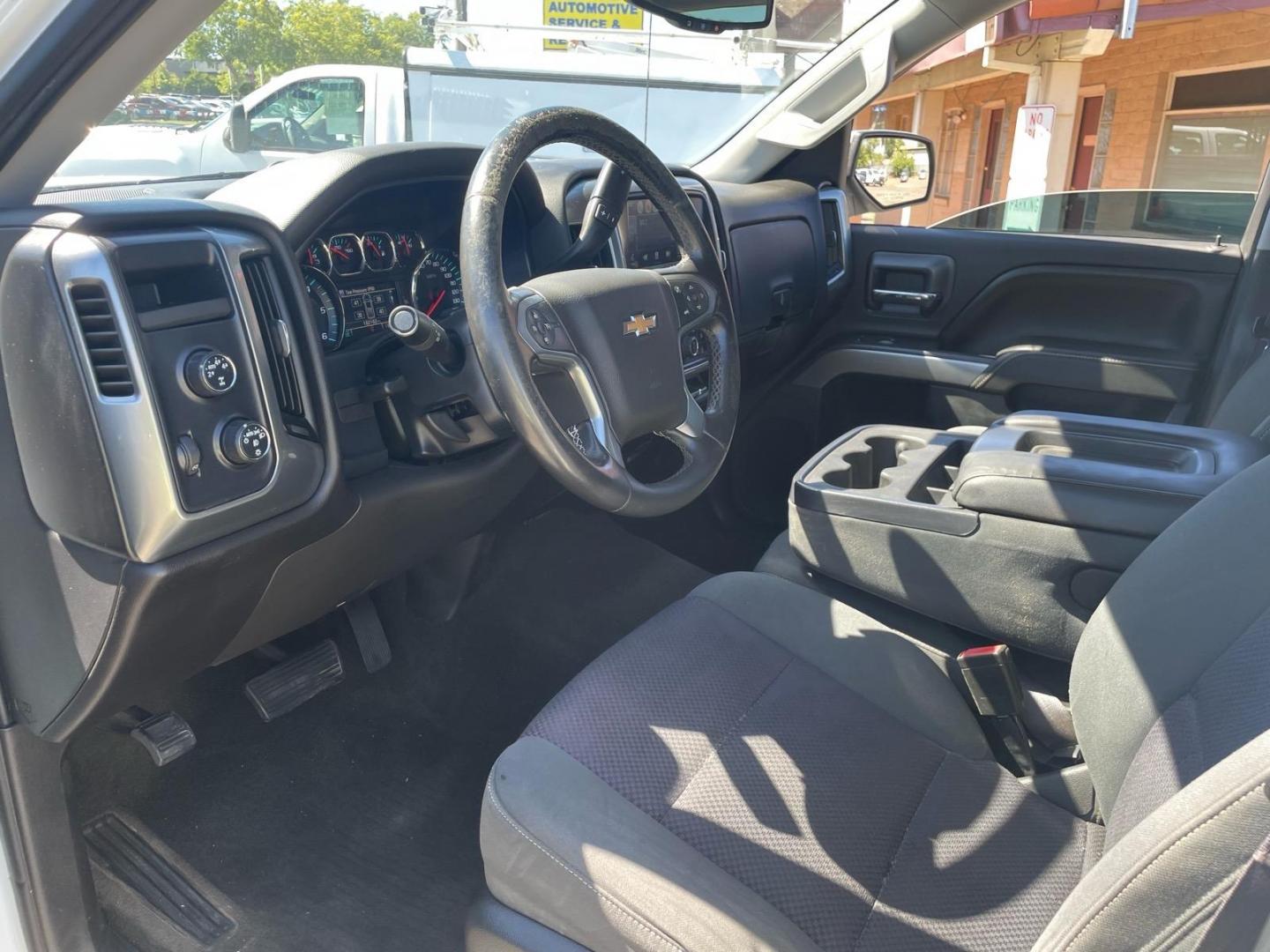 2015 Summit White Chevrolet Silverado 1500 LT (3GCUKREC8FG) with an 5.3L EcoTec3 5.3L V8 355hp 383ft. lbs. Direct Injection engine, 6-Speed Shiftable Automatic w/Overdrive transmission, located at 800 Riverside Ave, Roseville, CA, 95678, (916) 773-4549, 38.732265, -121.291039 - 4X4 CREW CAB LT SERVICE RECORDS ON CLEAN CARFAX- Photo#9