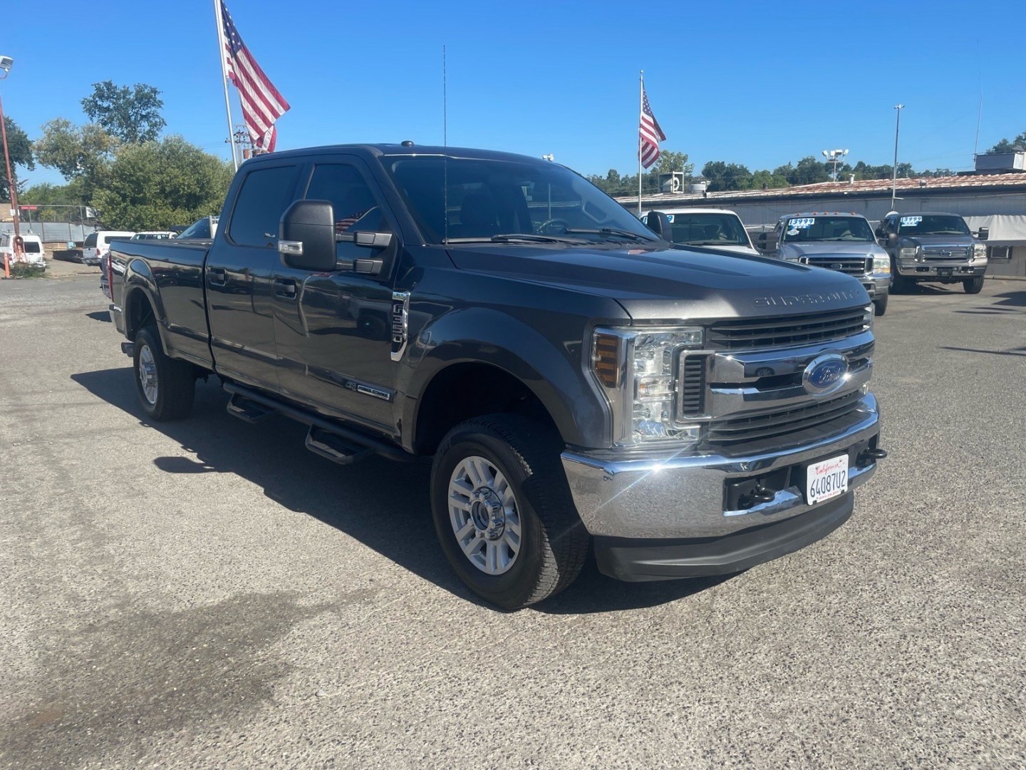 2018 Stone Gray Ford F-350 Super Duty XLT (1FT8W3BT0JE) with an 6.7L Power Stroke 6.7L Biodiesel Turbo V8 450hp 935ft. lbs. Common Rail Direct Injection engine, 6-Speed Shiftable Automatic transmission, located at 800 Riverside Ave, Roseville, CA, 95678, (916) 773-4549, 38.732265, -121.291039 - DIESEL CREW CAB 4X4 SERVICE RECORDS- Photo#1