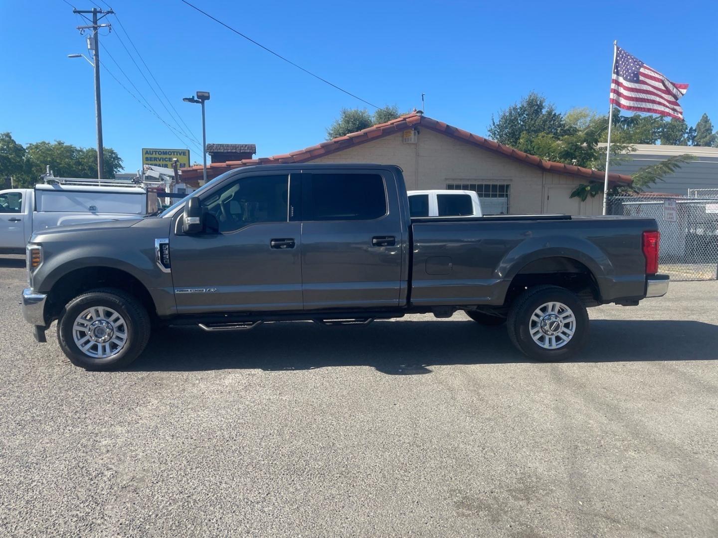 2018 Stone Gray Ford F-350 Super Duty XLT (1FT8W3BT0JE) with an 6.7L Power Stroke 6.7L Biodiesel Turbo V8 450hp 935ft. lbs. Common Rail Direct Injection engine, 6-Speed Shiftable Automatic transmission, located at 800 Riverside Ave, Roseville, CA, 95678, (916) 773-4549, 38.732265, -121.291039- Photo#4