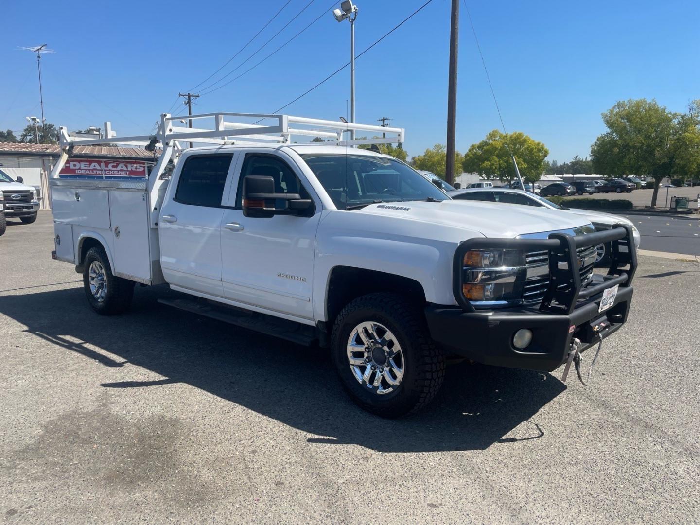 2015 Summit White Chevrolet Silverado 3500HD LT (1GB4KZE82FF) with an 6.6L Duramax 6.6L Diesel Turbo V8 397hp 765ft. lbs. Common Rail Direct Injection engine, Allison 1000 6-Speed Shiftable Automatic transmission, located at 800 Riverside Ave, Roseville, CA, 95678, (916) 773-4549, 38.732265, -121.291039 - DURAMAX DIESEL CREW CAB 4X4 LT UTILITY BED ALLISON TRANSMISSION ARB BUMPER WARN WINCH- Photo#1