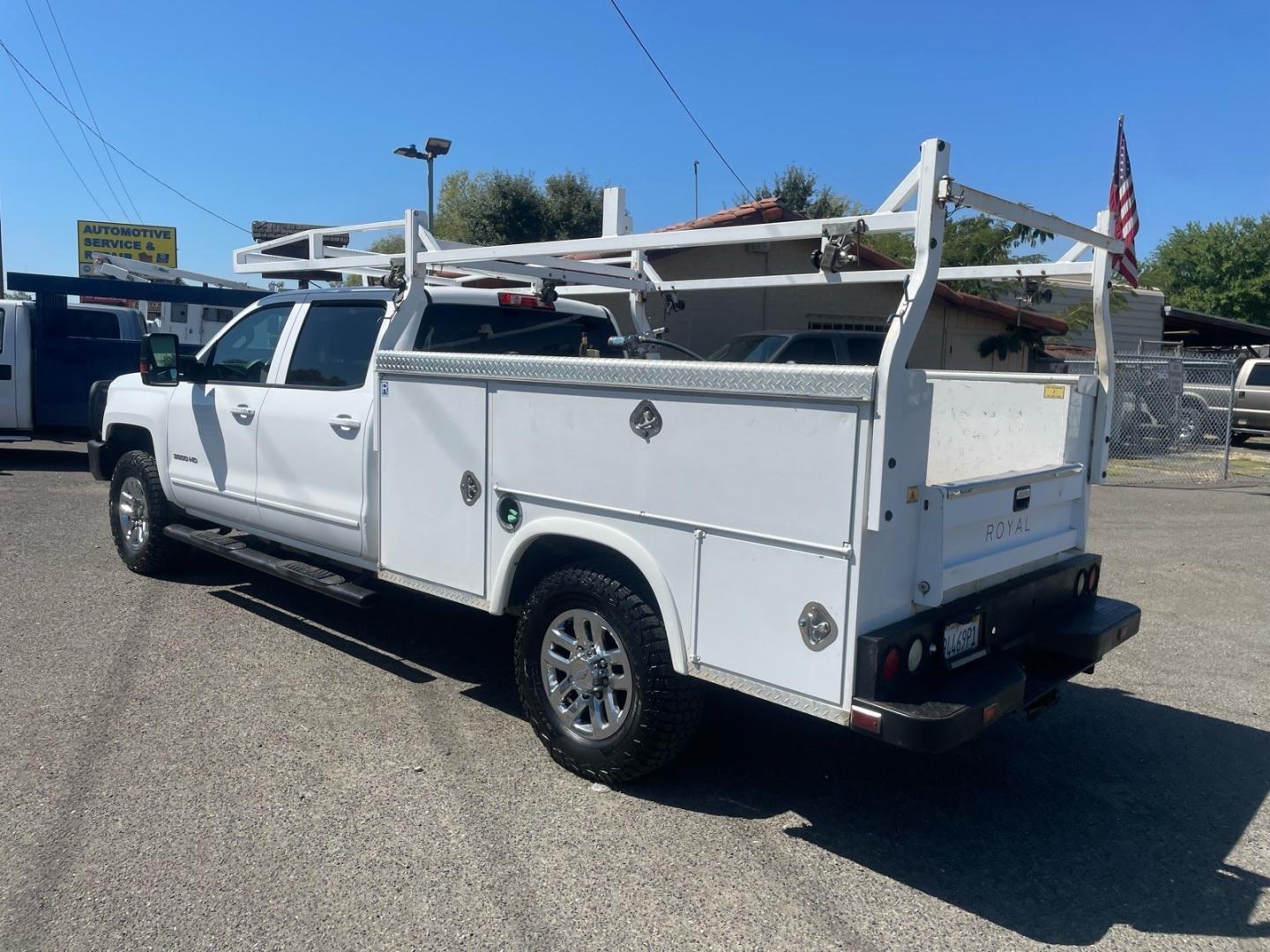 2015 Summit White Chevrolet Silverado 3500HD LT (1GB4KZE82FF) with an 6.6L Duramax 6.6L Diesel Turbo V8 397hp 765ft. lbs. Common Rail Direct Injection engine, Allison 1000 6-Speed Shiftable Automatic transmission, located at 800 Riverside Ave, Roseville, CA, 95678, (916) 773-4549, 38.732265, -121.291039 - DURAMAX DIESEL CREW CAB 4X4 LT UTILITY BED ALLISON TRANSMISSION ARB BUMPER WARN WINCH- Photo#3
