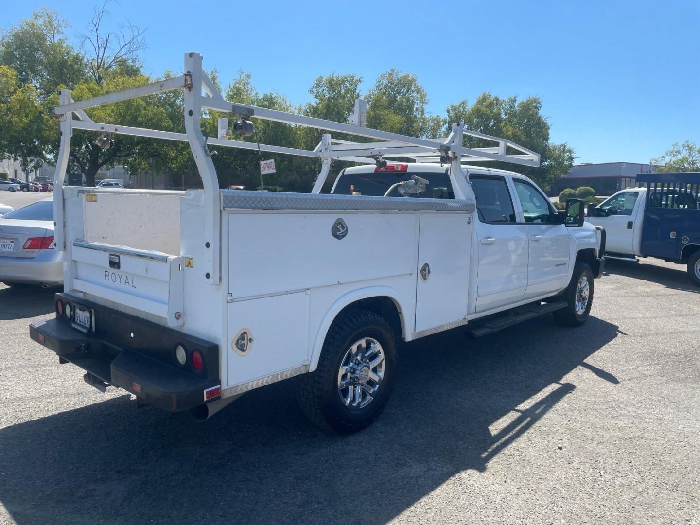 2015 Summit White Chevrolet Silverado 3500HD LT (1GB4KZE82FF) with an 6.6L Duramax 6.6L Diesel Turbo V8 397hp 765ft. lbs. Common Rail Direct Injection engine, Allison 1000 6-Speed Shiftable Automatic transmission, located at 800 Riverside Ave, Roseville, CA, 95678, (916) 773-4549, 38.732265, -121.291039 - DURAMAX DIESEL CREW CAB 4X4 LT UTILITY BED ALLISON TRANSMISSION ARB BUMPER WARN WINCH- Photo#4