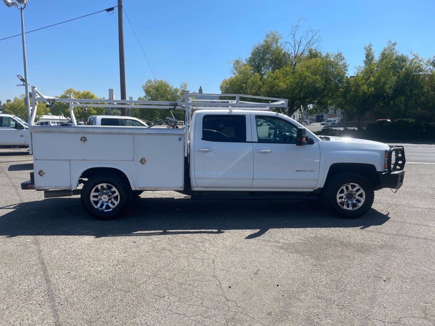 2015 Summit White Chevrolet Silverado 3500HD LT (1GB4KZE82FF) with an 6.6L Duramax 6.6L Diesel Turbo V8 397hp 765ft. lbs. Common Rail Direct Injection engine, Allison 1000 6-Speed Shiftable Automatic transmission, located at 800 Riverside Ave, Roseville, CA, 95678, (916) 773-4549, 38.732265, -121.291039 - DURAMAX DIESEL CREW CAB 4X4 LT UTILITY BED ALLISON TRANSMISSION ARB BUMPER WARN WINCH- Photo#6
