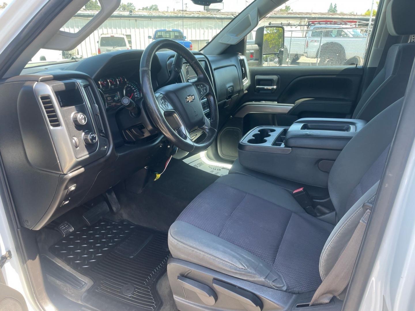2015 Summit White Chevrolet Silverado 3500HD LT (1GB4KZE82FF) with an 6.6L Duramax 6.6L Diesel Turbo V8 397hp 765ft. lbs. Common Rail Direct Injection engine, Allison 1000 6-Speed Shiftable Automatic transmission, located at 800 Riverside Ave, Roseville, CA, 95678, (916) 773-4549, 38.732265, -121.291039 - DURAMAX DIESEL CREW CAB 4X4 LT UTILITY BED ALLISON TRANSMISSION ARB BUMPER WARN WINCH- Photo#11