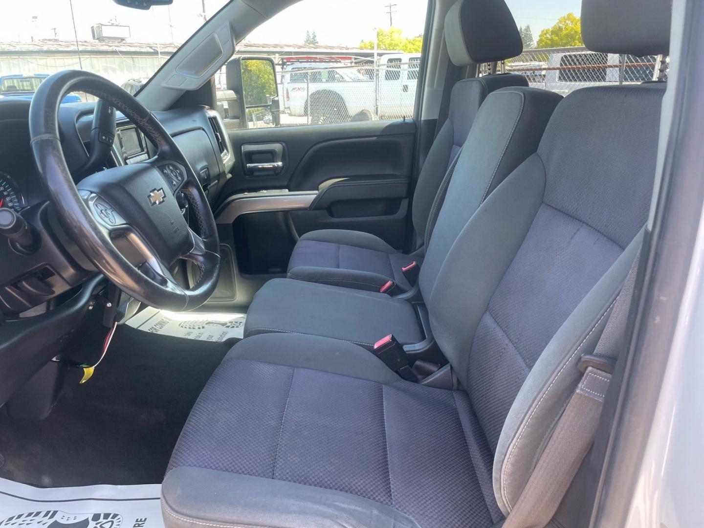 2015 Summit White Chevrolet Silverado 3500HD LT (1GB4KZE82FF) with an 6.6L Duramax 6.6L Diesel Turbo V8 397hp 765ft. lbs. Common Rail Direct Injection engine, Allison 1000 6-Speed Shiftable Automatic transmission, located at 800 Riverside Ave, Roseville, CA, 95678, (916) 773-4549, 38.732265, -121.291039 - DURAMAX DIESEL CREW CAB 4X4 LT UTILITY BED ALLISON TRANSMISSION ARB BUMPER WARN WINCH- Photo#12
