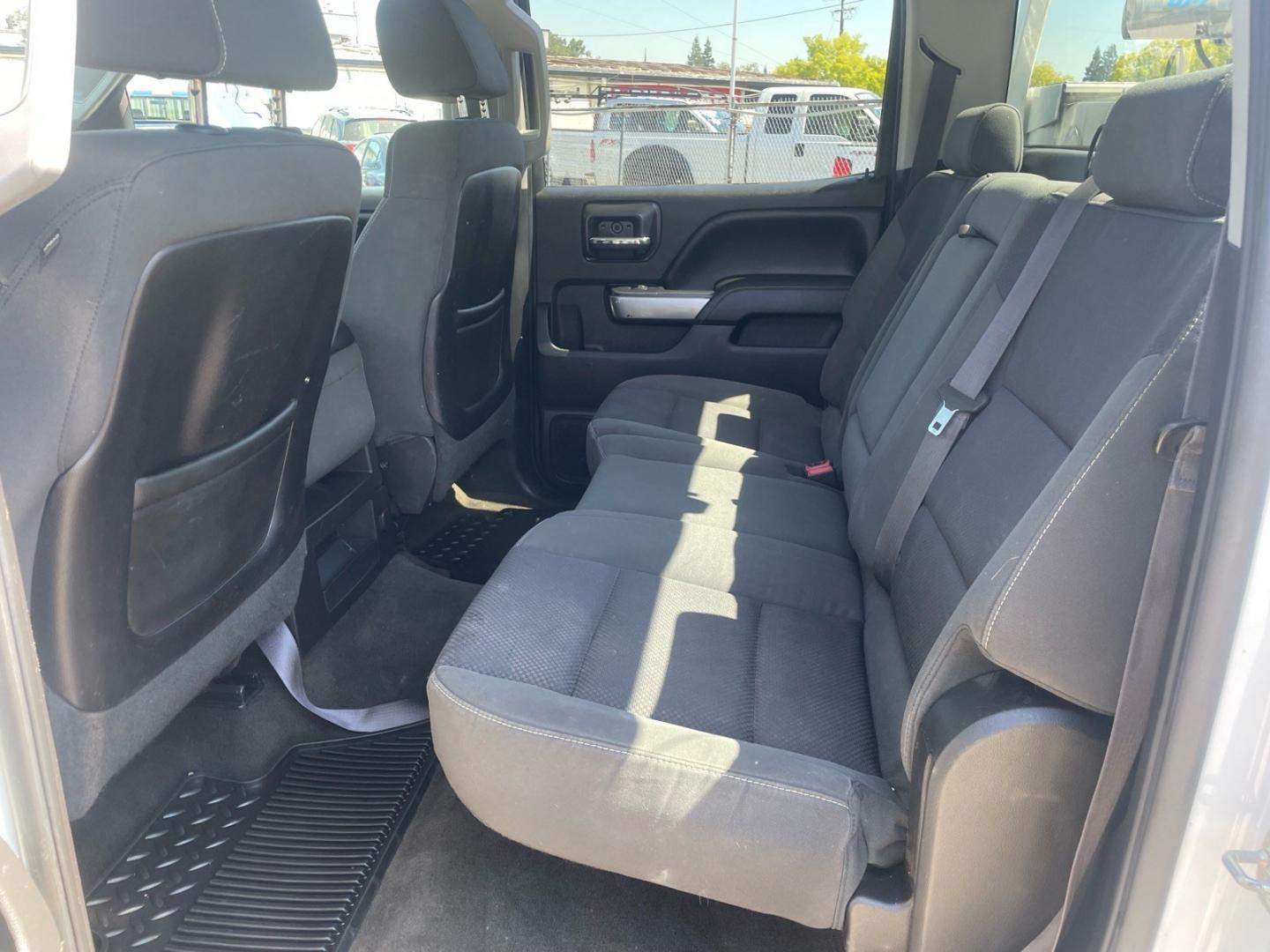 2015 Summit White Chevrolet Silverado 3500HD LT (1GB4KZE82FF) with an 6.6L Duramax 6.6L Diesel Turbo V8 397hp 765ft. lbs. Common Rail Direct Injection engine, Allison 1000 6-Speed Shiftable Automatic transmission, located at 800 Riverside Ave, Roseville, CA, 95678, (916) 773-4549, 38.732265, -121.291039 - DURAMAX DIESEL CREW CAB 4X4 LT UTILITY BED ALLISON TRANSMISSION ARB BUMPER WARN WINCH- Photo#13