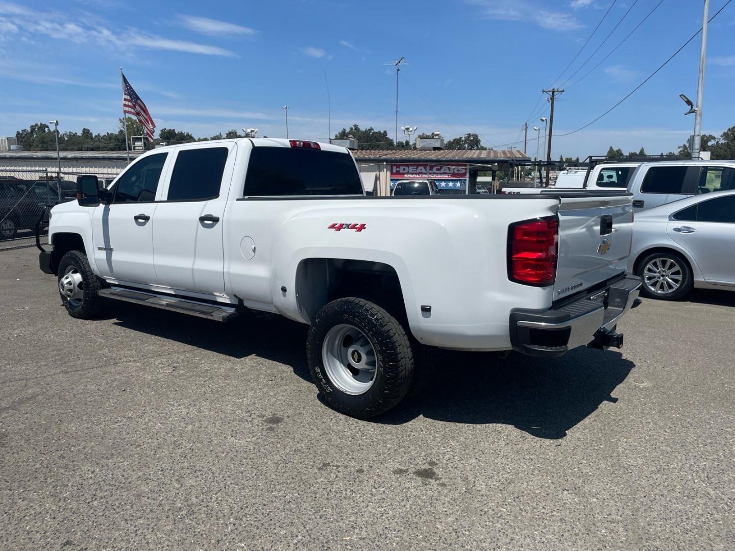 2019 Summit White Chevrolet Silverado 3500HD Work Truck (1GC4KVCY0KF) with an 6.6L Duramax 6.6L Biodiesel Turbo V8 445hp 910ft. lbs. Common Rail Direct Injection engine, Allison 1000 6-Speed Shiftable Automatic transmission, located at 800 Riverside Ave, Roseville, CA, 95678, (916) 773-4549, 38.732265, -121.291039 - DURAMAX DIESEL CREW CAB DUALLY 4X4 DIESEL ALLISON TRANSMISSION SERVICE RECORDS ON CLEAN CARFAX- Photo#3