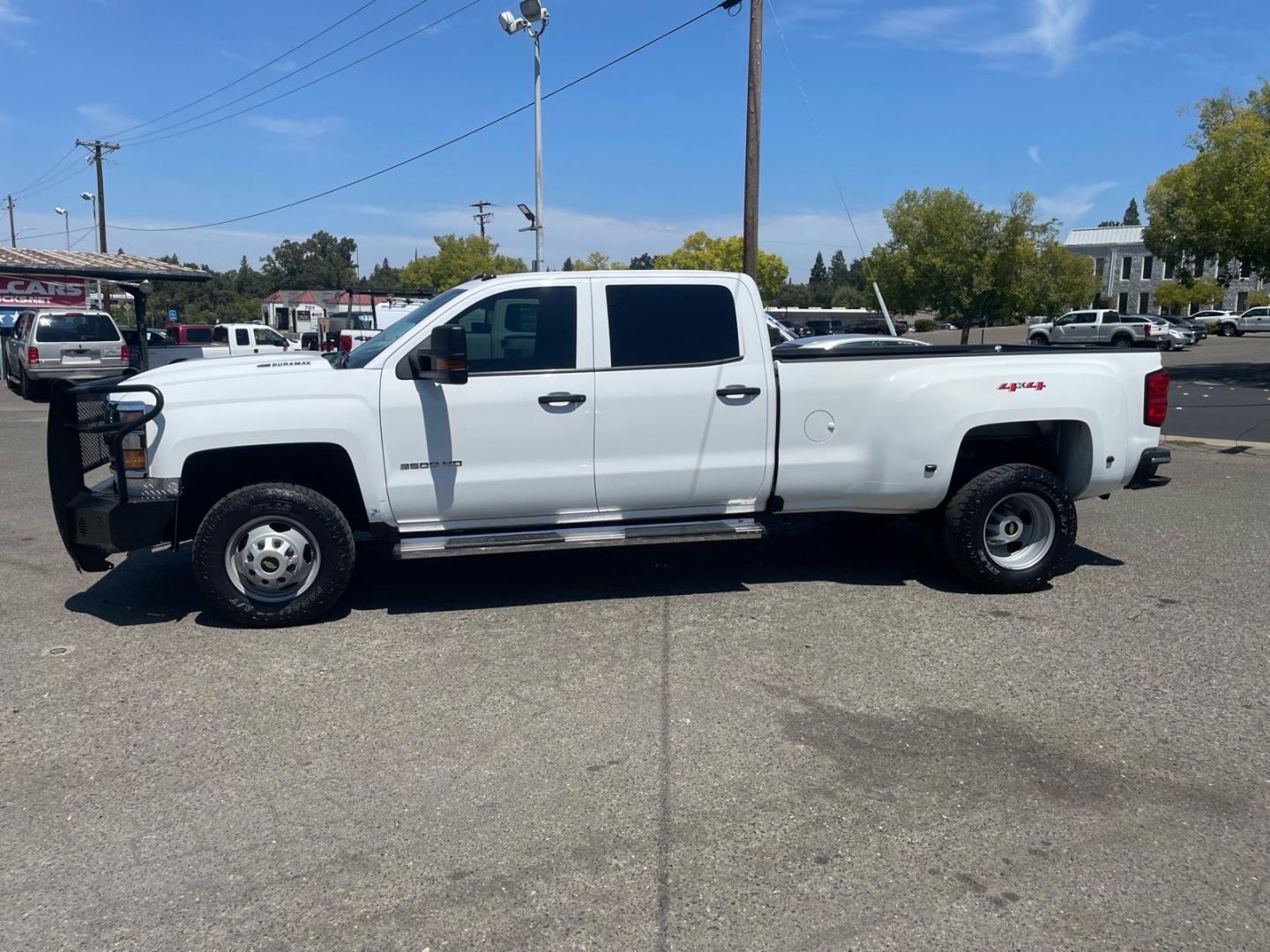 2019 Summit White Chevrolet Silverado 3500HD Work Truck (1GC4KVCY0KF) with an 6.6L Duramax 6.6L Biodiesel Turbo V8 445hp 910ft. lbs. Common Rail Direct Injection engine, Allison 1000 6-Speed Shiftable Automatic transmission, located at 800 Riverside Ave, Roseville, CA, 95678, (916) 773-4549, 38.732265, -121.291039 - DURAMAX DIESEL CREW CAB DUALLY 4X4 DIESEL ALLISON TRANSMISSION SERVICE RECORDS ON CLEAN CARFAX- Photo#5