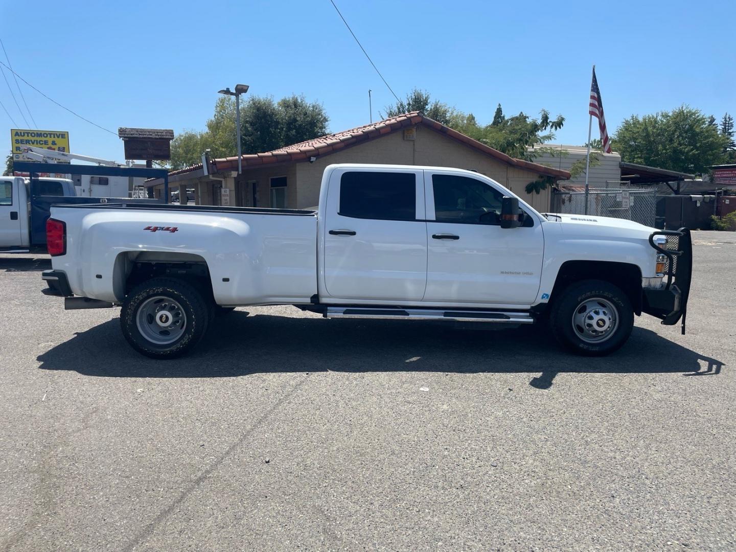 2019 Summit White Chevrolet Silverado 3500HD Work Truck (1GC4KVCY0KF) with an 6.6L Duramax 6.6L Biodiesel Turbo V8 445hp 910ft. lbs. Common Rail Direct Injection engine, Allison 1000 6-Speed Shiftable Automatic transmission, located at 800 Riverside Ave, Roseville, CA, 95678, (916) 773-4549, 38.732265, -121.291039 - DURAMAX DIESEL CREW CAB DUALLY 4X4 DIESEL ALLISON TRANSMISSION SERVICE RECORDS ON CLEAN CARFAX- Photo#6