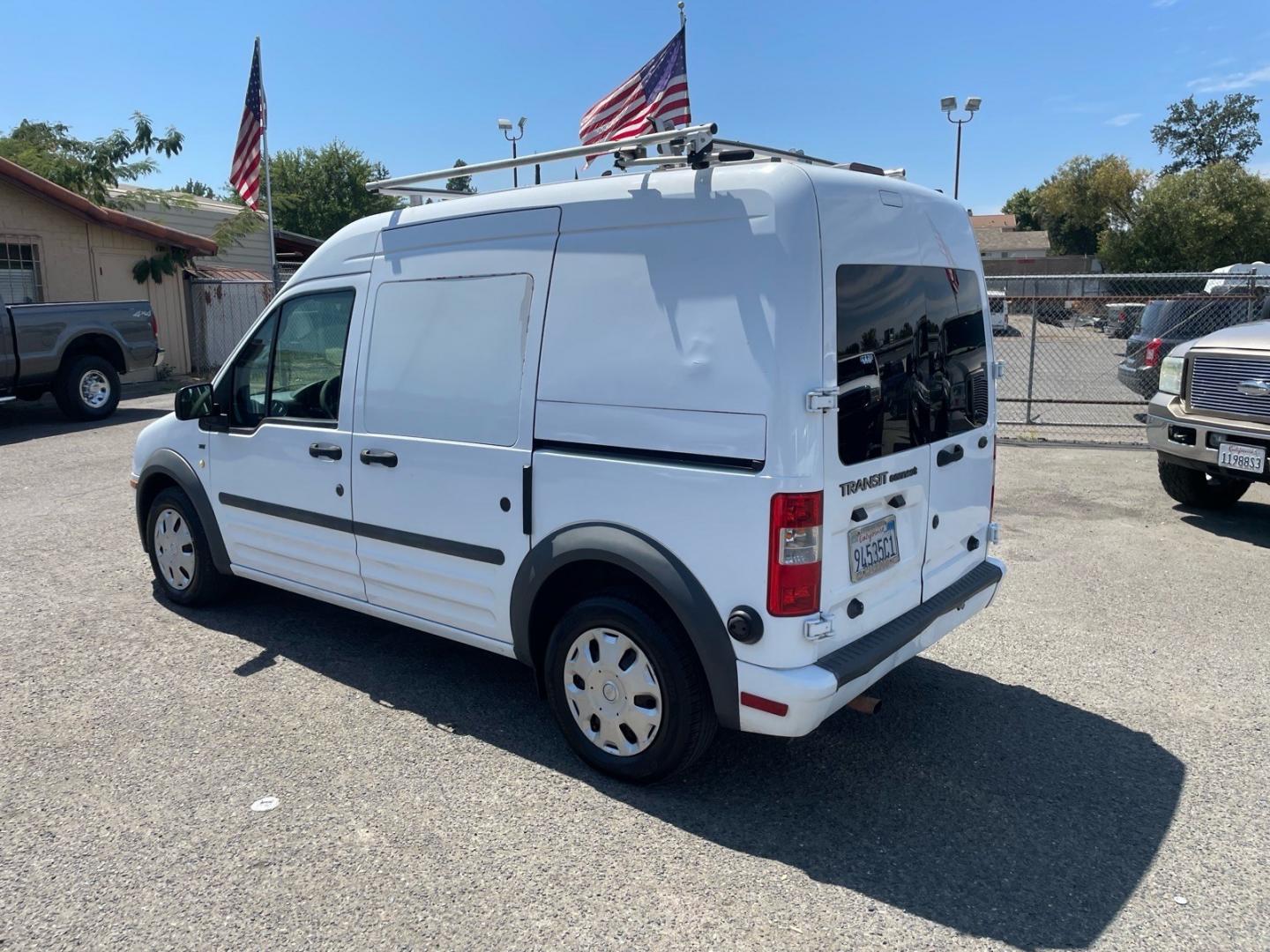 2011 Frozen White Ford Transit Connect XLT (NM0LS7DN0BT) with an 2.0L Duratec 2.0L I4 136hp 128ft. lbs. Sequential Multiport Fuel Injection engine, 4-Speed Automatic transmission, located at 800 Riverside Ave, Roseville, CA, 95678, (916) 773-4549, 38.732265, -121.291039- Photo#2