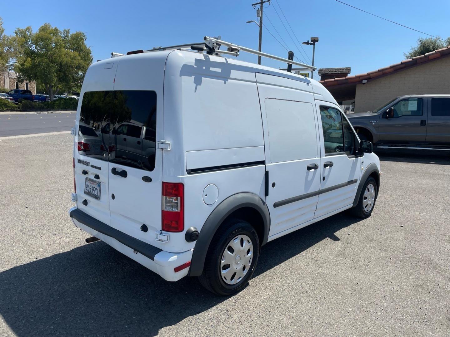 2011 Frozen White Ford Transit Connect XLT (NM0LS7DN0BT) with an 2.0L Duratec 2.0L I4 136hp 128ft. lbs. Sequential Multiport Fuel Injection engine, 4-Speed Automatic transmission, located at 800 Riverside Ave, Roseville, CA, 95678, (916) 773-4549, 38.732265, -121.291039- Photo#3