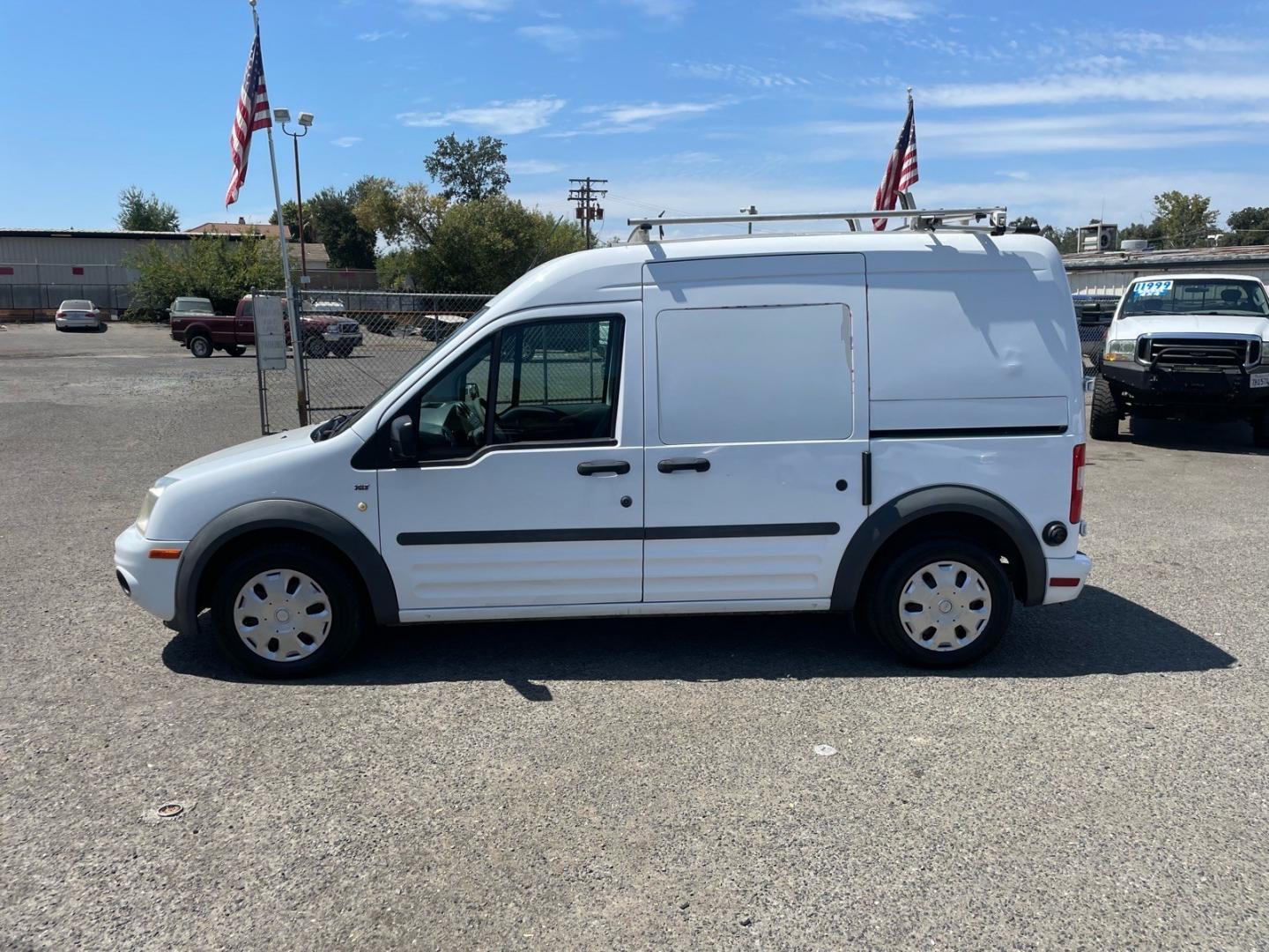 2011 Frozen White Ford Transit Connect XLT (NM0LS7DN0BT) with an 2.0L Duratec 2.0L I4 136hp 128ft. lbs. Sequential Multiport Fuel Injection engine, 4-Speed Automatic transmission, located at 800 Riverside Ave, Roseville, CA, 95678, (916) 773-4549, 38.732265, -121.291039- Photo#4