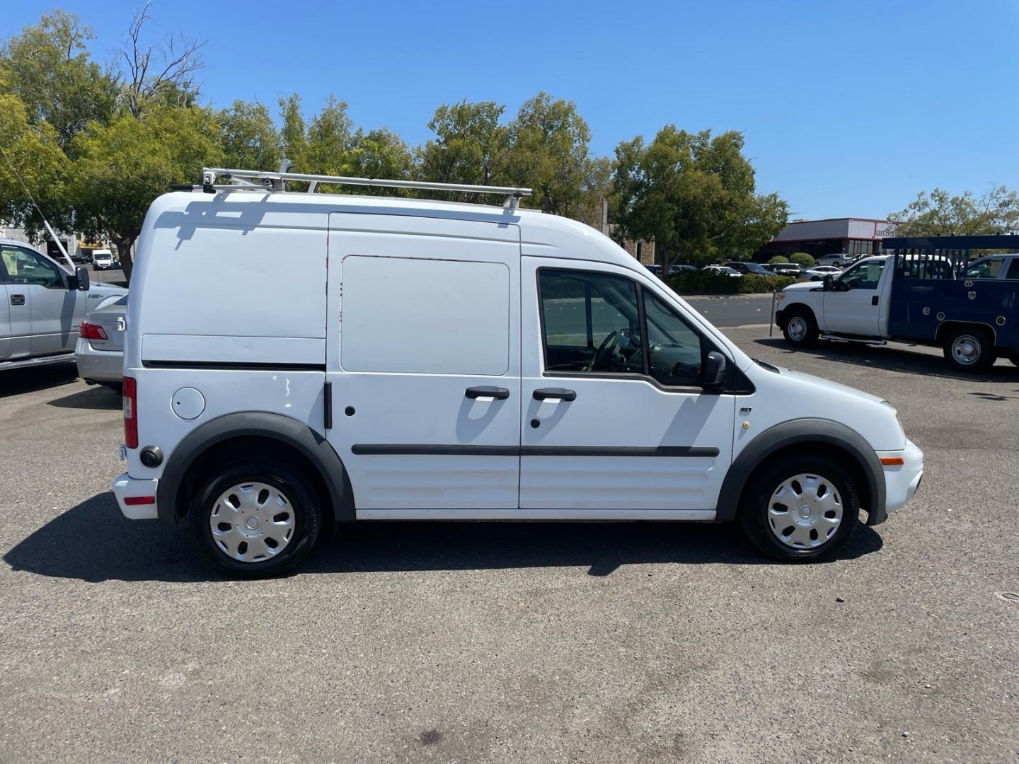2011 Frozen White Ford Transit Connect XLT (NM0LS7DN0BT) with an 2.0L Duratec 2.0L I4 136hp 128ft. lbs. Sequential Multiport Fuel Injection engine, 4-Speed Automatic transmission, located at 800 Riverside Ave, Roseville, CA, 95678, (916) 773-4549, 38.732265, -121.291039- Photo#5