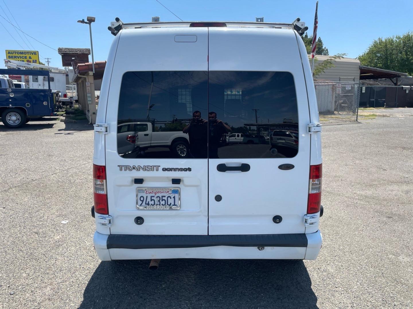 2011 Frozen White Ford Transit Connect XLT (NM0LS7DN0BT) with an 2.0L Duratec 2.0L I4 136hp 128ft. lbs. Sequential Multiport Fuel Injection engine, 4-Speed Automatic transmission, located at 800 Riverside Ave, Roseville, CA, 95678, (916) 773-4549, 38.732265, -121.291039- Photo#7