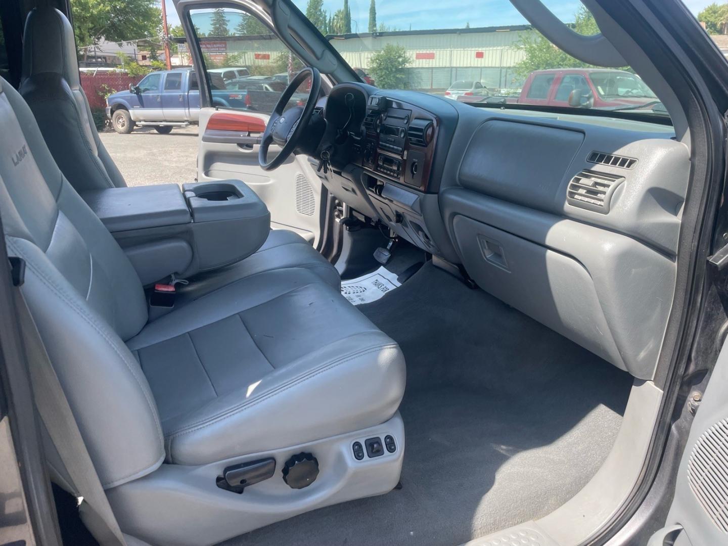 2005 Dark Shadow Grey Clearcoat Metallic Ford F-250 Super Duty Lariat (1FTSW21P45E) with an 6.0L Power Stroke 6.0L Diesel Turbo V8 325hp 560ft. lbs. Direct Injection engine, 5-Speed Automatic transmission, located at 800 Riverside Ave, Roseville, CA, 95678, (916) 773-4549, 38.732265, -121.291039 - DIESEL CREW CAB 4X4 FX4 LARIAT HEADSTUDS SERVICE RECORDS- Photo#11