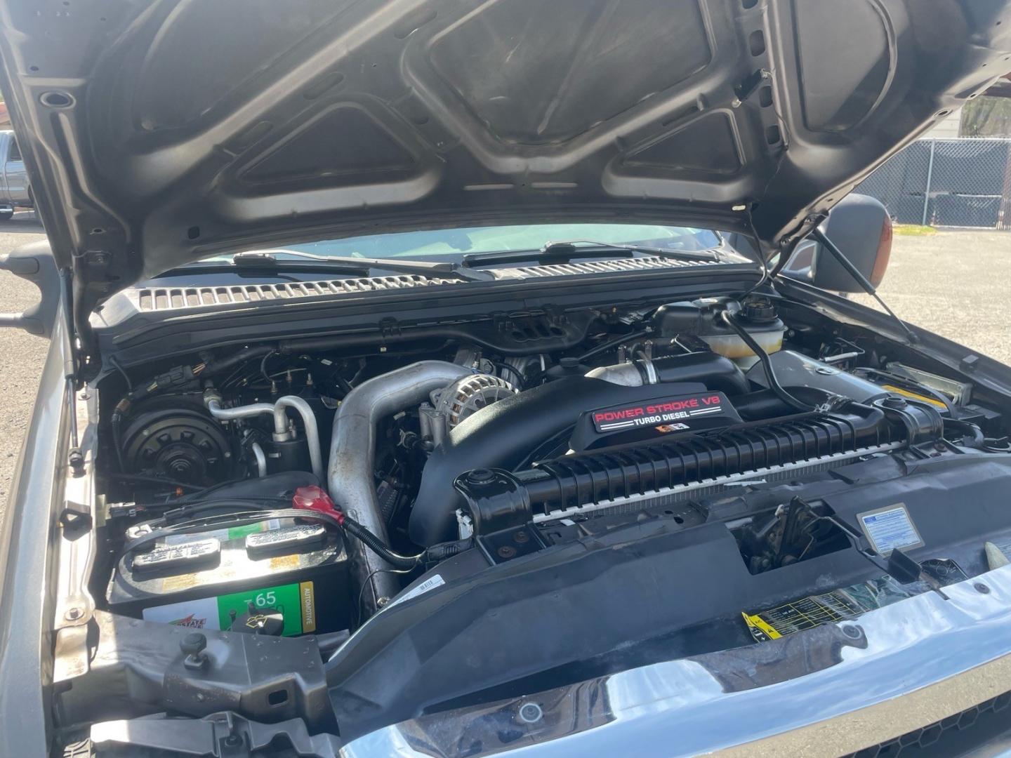 2005 Dark Shadow Grey Clearcoat Metallic Ford F-250 Super Duty Lariat (1FTSW21P45E) with an 6.0L Power Stroke 6.0L Diesel Turbo V8 325hp 560ft. lbs. Direct Injection engine, 5-Speed Automatic transmission, located at 800 Riverside Ave, Roseville, CA, 95678, (916) 773-4549, 38.732265, -121.291039 - DIESEL CREW CAB 4X4 FX4 LARIAT HEADSTUDS SERVICE RECORDS- Photo#14