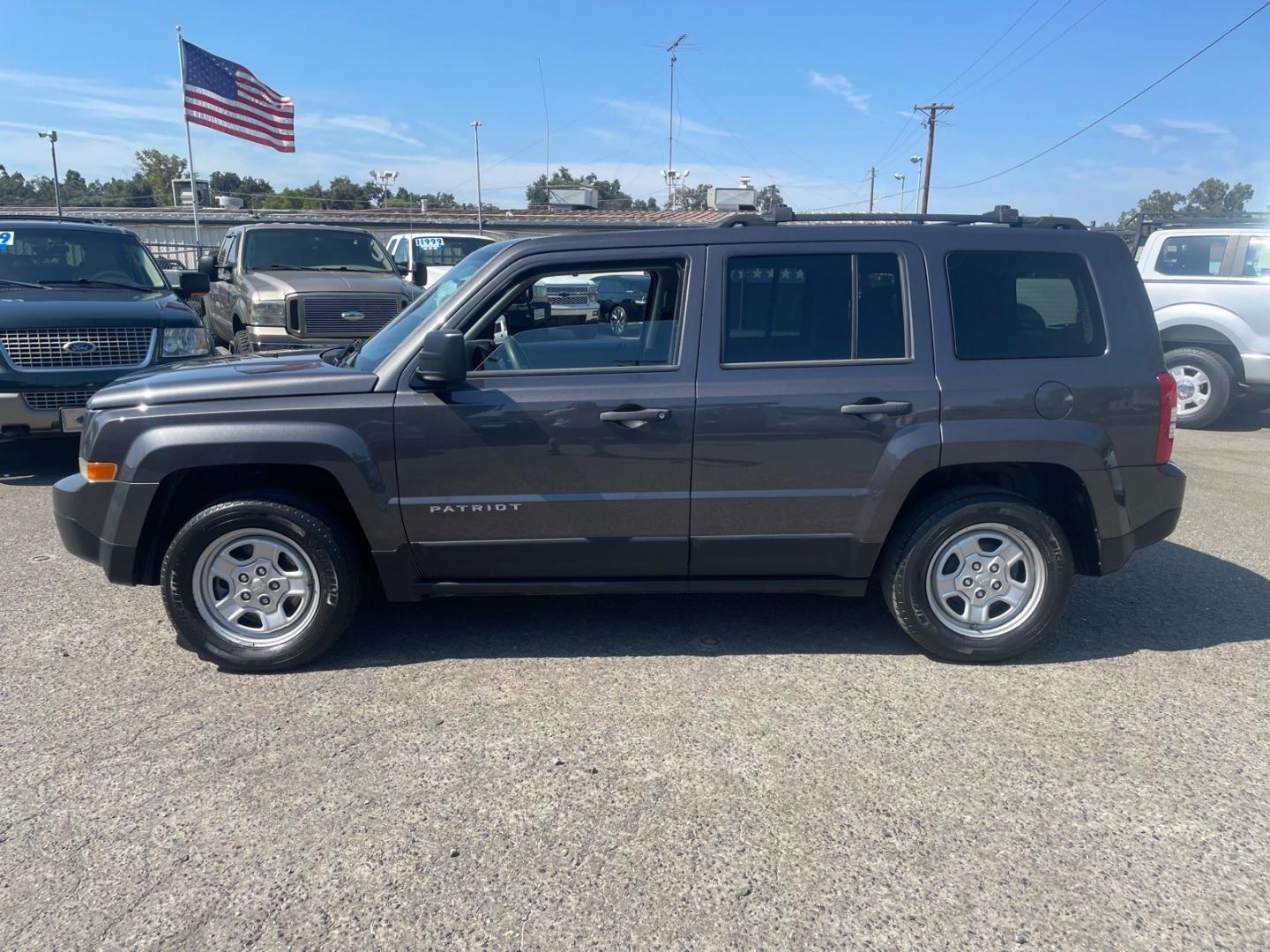 2015 Billet Silver Metallic Clear Coat Jeep Patriot Sport (1C4NJPBB5FD) with an 2.4L 2.4L I4 172hp 165ft. lbs. Sequential Multiport Fuel Injection engine, 5-Speed Manual transmission, located at 800 Riverside Ave, Roseville, CA, 95678, (916) 773-4549, 38.732265, -121.291039- Photo#1