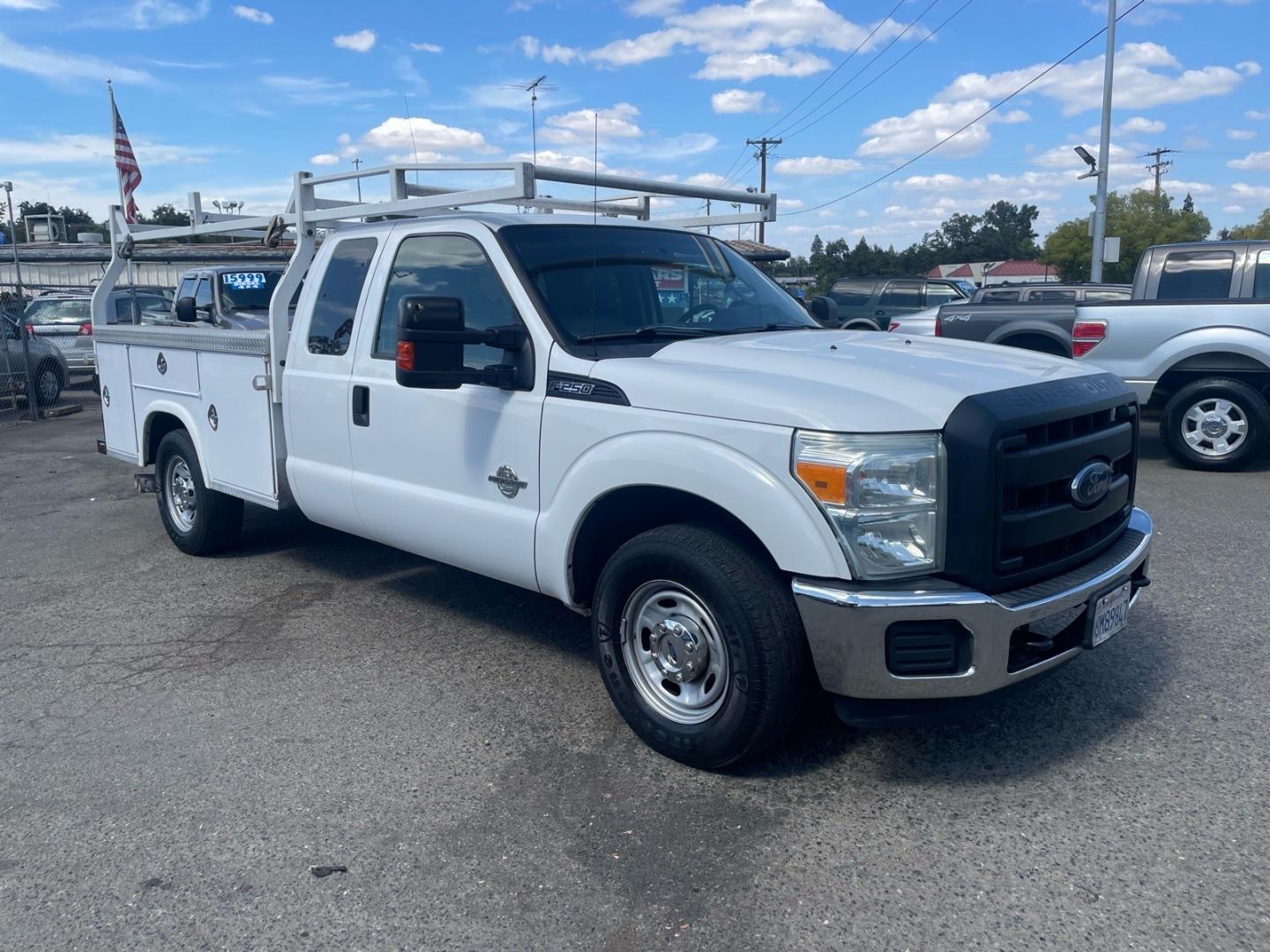 2015 Oxford White Ford F-250 Super Duty XL (1FD7X2AT7FE) with an 6.7L Power Stroke 6.7L Biodiesel Turbo V8 440hp 860ft. lbs. Common Rail Direct Injection engine, 6-Speed Shiftable Automatic transmission, located at 800 Riverside Ave, Roseville, CA, 95678, (916) 773-4549, 38.732265, -121.291039 - DIESEL SUPER CAB UTILITY BED CLEAN CARFAX- Photo#1