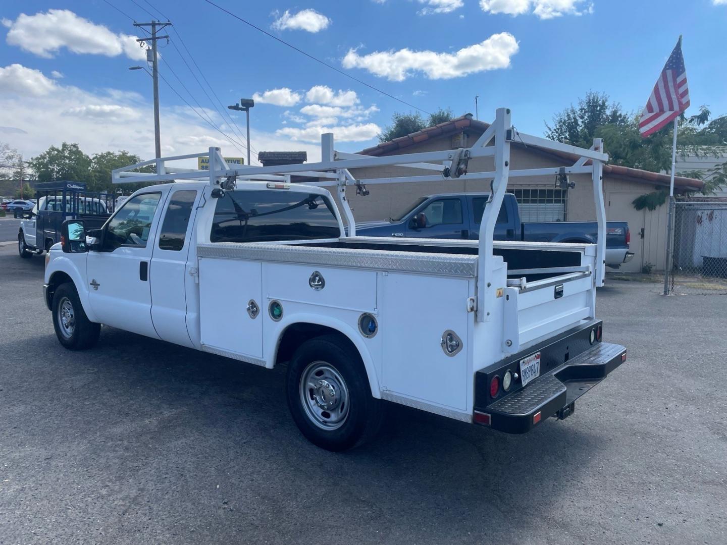 2015 Oxford White Ford F-250 Super Duty XL (1FD7X2AT7FE) with an 6.7L Power Stroke 6.7L Biodiesel Turbo V8 440hp 860ft. lbs. Common Rail Direct Injection engine, 6-Speed Shiftable Automatic transmission, located at 800 Riverside Ave, Roseville, CA, 95678, (916) 773-4549, 38.732265, -121.291039 - DIESEL SUPER CAB UTILITY BED CLEAN CARFAX- Photo#2