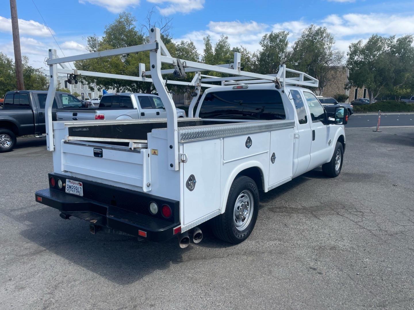 2015 Oxford White Ford F-250 Super Duty XL (1FD7X2AT7FE) with an 6.7L Power Stroke 6.7L Biodiesel Turbo V8 440hp 860ft. lbs. Common Rail Direct Injection engine, 6-Speed Shiftable Automatic transmission, located at 800 Riverside Ave, Roseville, CA, 95678, (916) 773-4549, 38.732265, -121.291039 - DIESEL SUPER CAB UTILITY BED CLEAN CARFAX- Photo#3