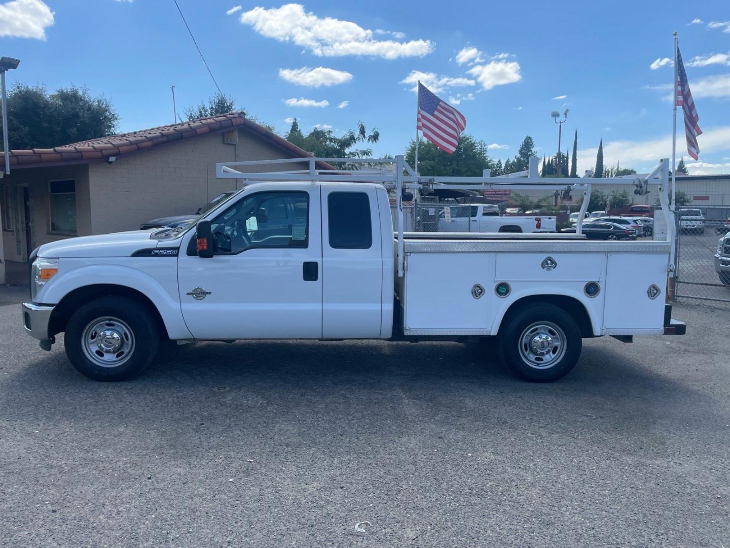 2015 Oxford White Ford F-250 Super Duty XL (1FD7X2AT7FE) with an 6.7L Power Stroke 6.7L Biodiesel Turbo V8 440hp 860ft. lbs. Common Rail Direct Injection engine, 6-Speed Shiftable Automatic transmission, located at 800 Riverside Ave, Roseville, CA, 95678, (916) 773-4549, 38.732265, -121.291039 - DIESEL SUPER CAB UTILITY BED CLEAN CARFAX- Photo#4