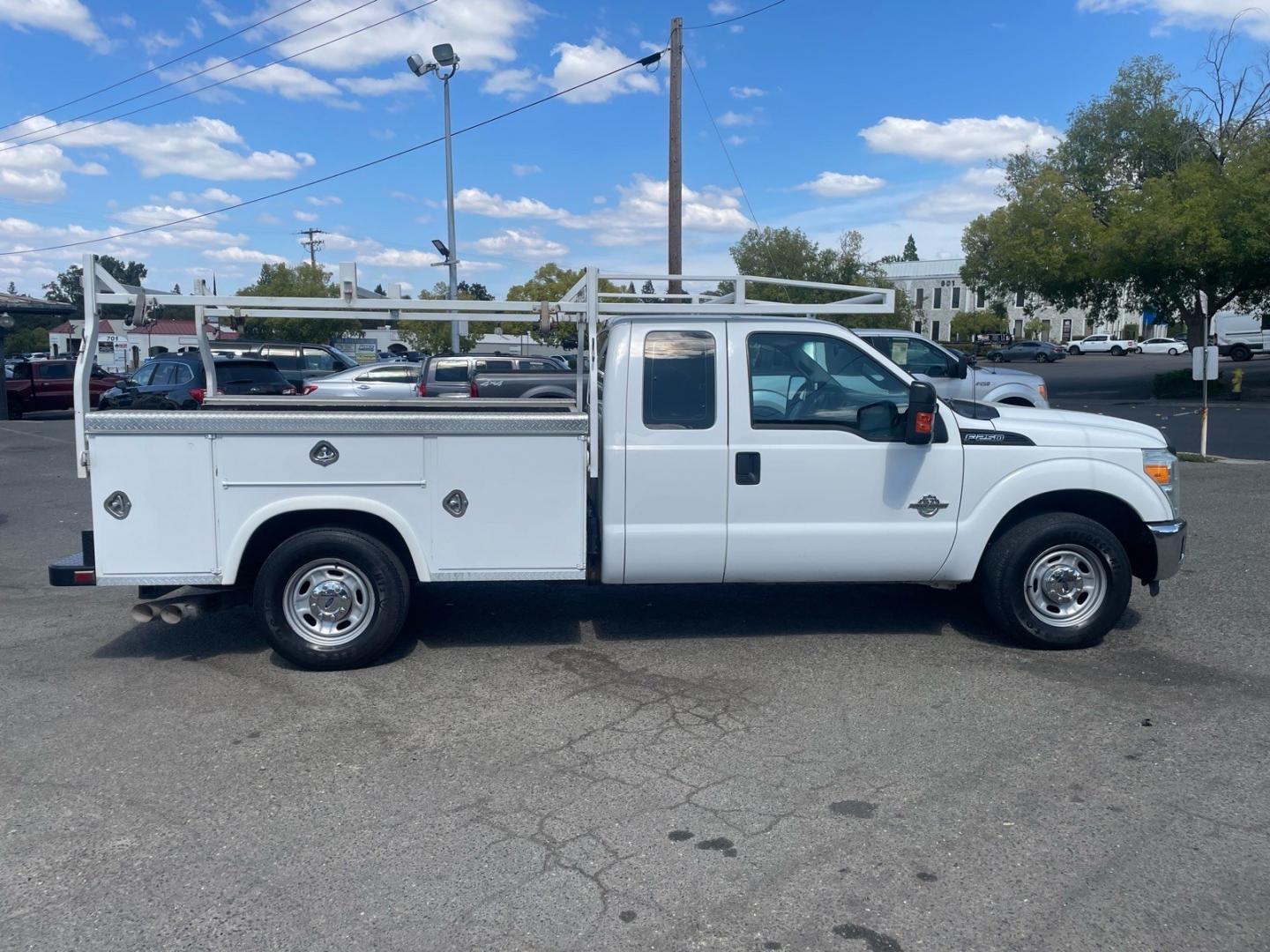 2015 Oxford White Ford F-250 Super Duty XL (1FD7X2AT7FE) with an 6.7L Power Stroke 6.7L Biodiesel Turbo V8 440hp 860ft. lbs. Common Rail Direct Injection engine, 6-Speed Shiftable Automatic transmission, located at 800 Riverside Ave, Roseville, CA, 95678, (916) 773-4549, 38.732265, -121.291039 - DIESEL SUPER CAB UTILITY BED CLEAN CARFAX- Photo#5