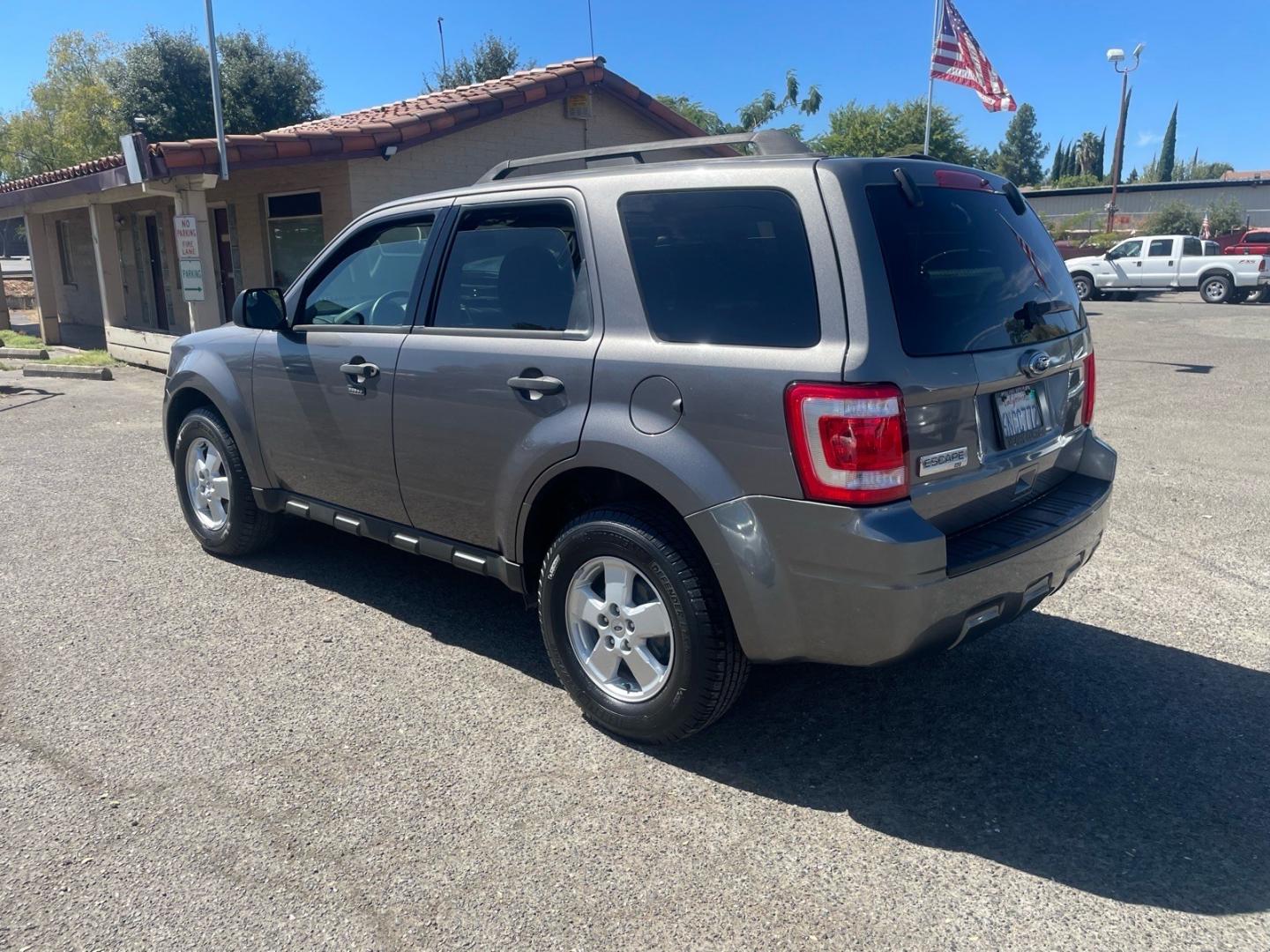2010 Sterling Grey Metallic Ford Escape XLT (1FMCU0D74AK) with an 2.5L Duratec 2.5L I4 171hp 171ft. lbs. Sequential Multiport Fuel Injection engine, 6-Speed Automatic transmission, located at 800 Riverside Ave, Roseville, CA, 95678, (916) 773-4549, 38.732265, -121.291039- Photo#2