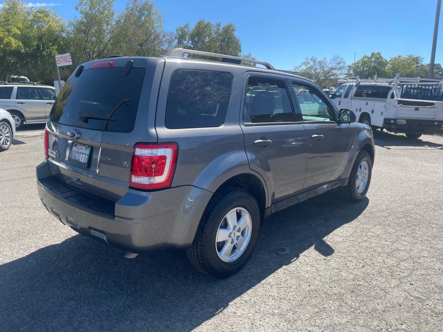 2010 Sterling Grey Metallic Ford Escape XLT (1FMCU0D74AK) with an 2.5L Duratec 2.5L I4 171hp 171ft. lbs. Sequential Multiport Fuel Injection engine, 6-Speed Automatic transmission, located at 800 Riverside Ave, Roseville, CA, 95678, (916) 773-4549, 38.732265, -121.291039- Photo#3