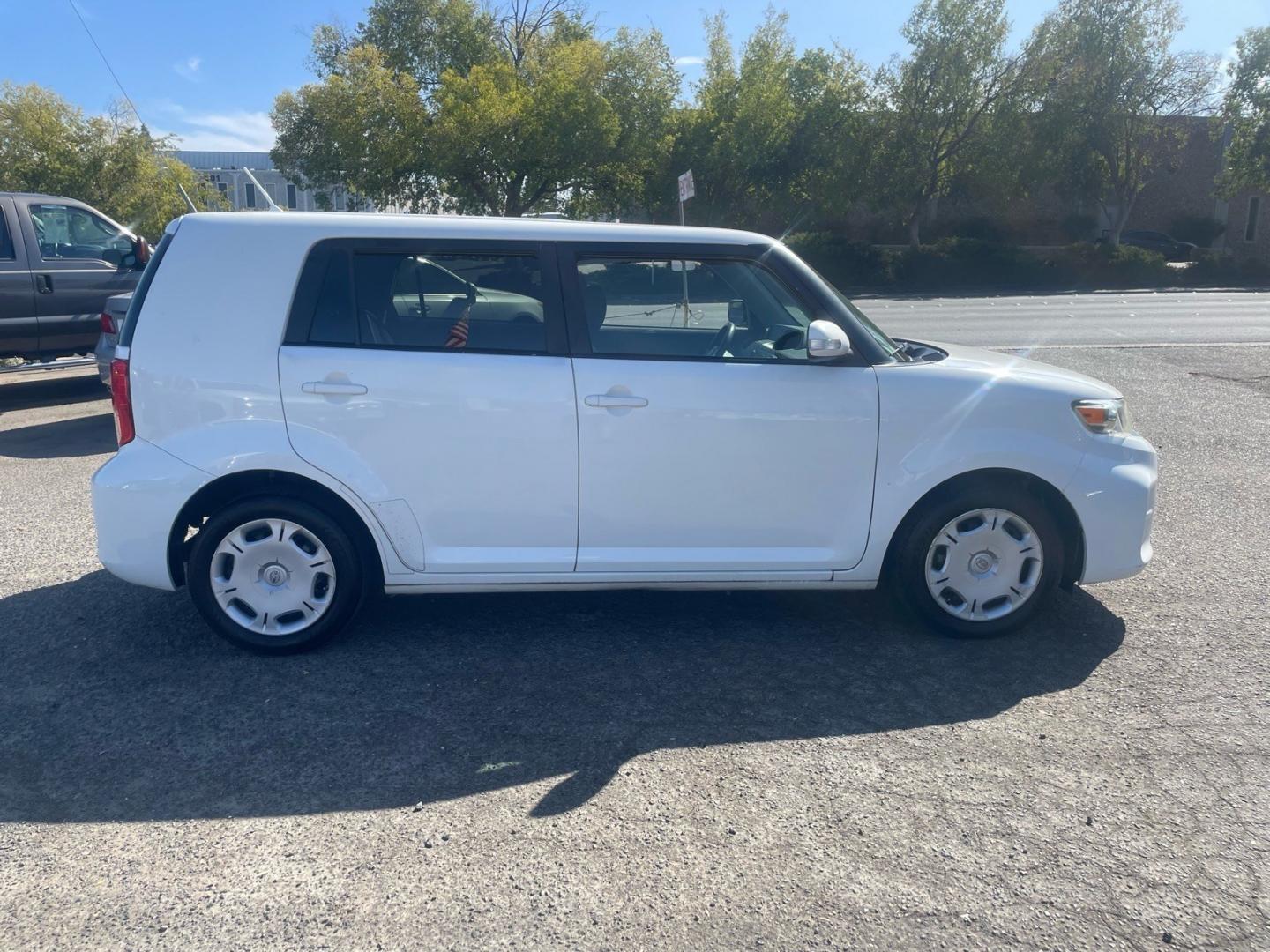 2012 Super White Scion xB Base (JTLZE4FE3CJ) with an 2.4L 2.4L I4 158hp 162ft. lbs. Sequential Electronic Fuel Injection engine, 4-Speed Automatic transmission, located at 800 Riverside Ave, Roseville, CA, 95678, (916) 773-4549, 38.732265, -121.291039- Photo#5