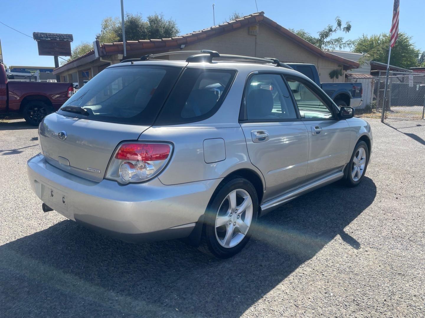 2006 Crystal Gray Metallic Subaru Impreza 2.5 i (JF1GG67626G) with an 2.5L 2L NA H4 single overhead cam (SOHC) 16V Other engine, 5-Speed Manual transmission, located at 800 Riverside Ave, Roseville, CA, 95678, (916) 773-4549, 38.732265, -121.291039 - AWD ONE OWNER CLEAN CARFAX- Photo#3
