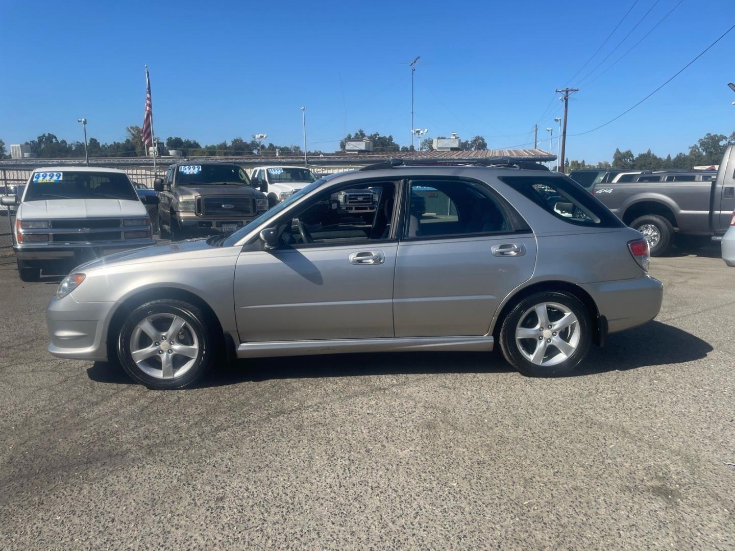 2006 Crystal Gray Metallic Subaru Impreza 2.5 i (JF1GG67626G) with an 2.5L 2L NA H4 single overhead cam (SOHC) 16V Other engine, 5-Speed Manual transmission, located at 800 Riverside Ave, Roseville, CA, 95678, (916) 773-4549, 38.732265, -121.291039 - AWD ONE OWNER CLEAN CARFAX- Photo#4